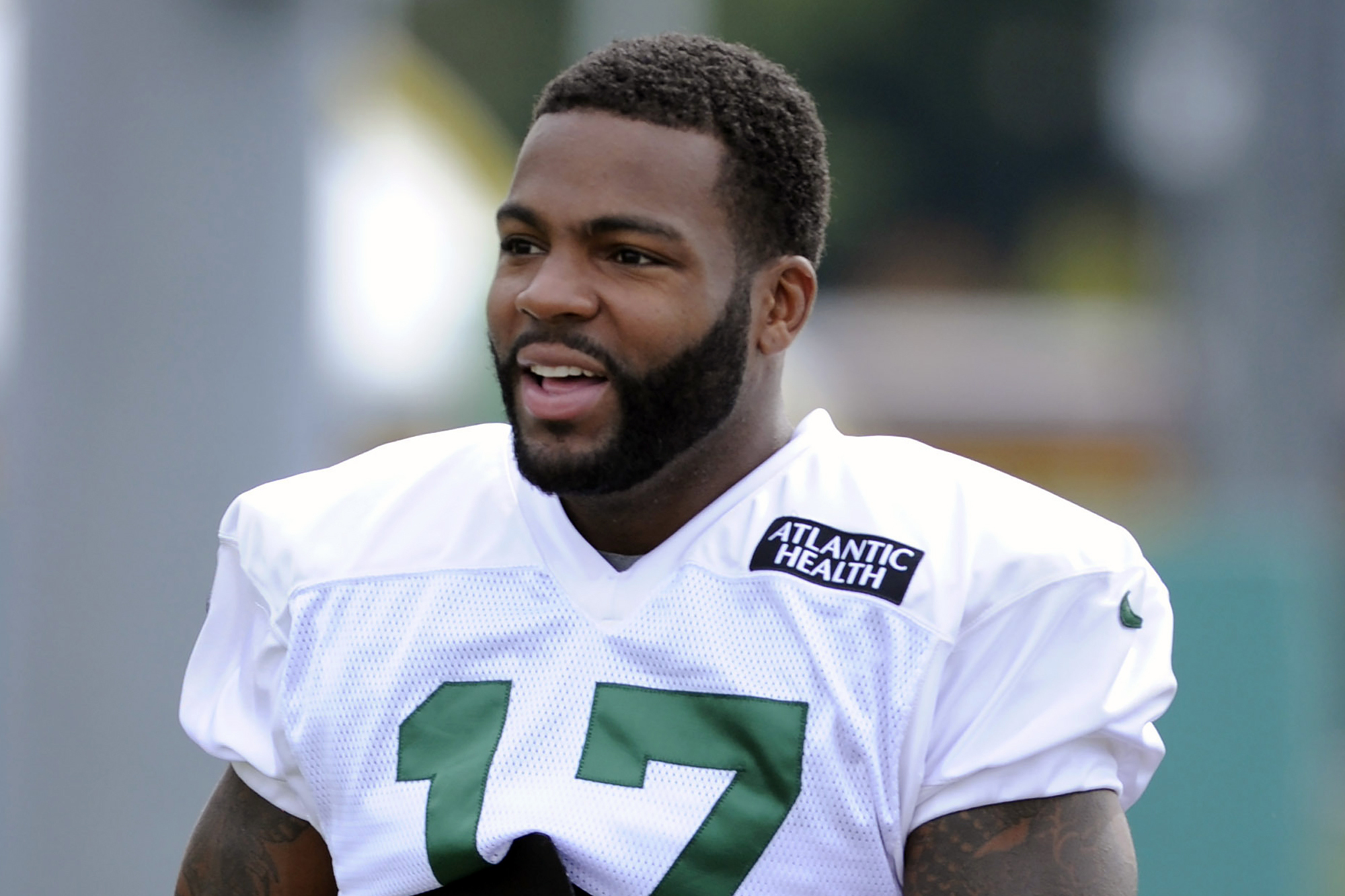 FILE - New York Jets wide receiver Braylon Edwards heads to the practice field at their NFL football training camp Saturday, July 27, 2013, in Cortland, N.Y. A man has been charged with attempted murder in a locker room attack at a suburban Detroit YMCA that was broken up by former NFL player Braylon Edwards. Edwards said he was “just minding my business” Friday, March 1, 2024, when he heard a dispute about loud music at the recreation center in Farmington Hills. Edwards said he stopped the assault of an 80-year-old man, who had a head injury. (AP Photo/Bill Kostroun, File)