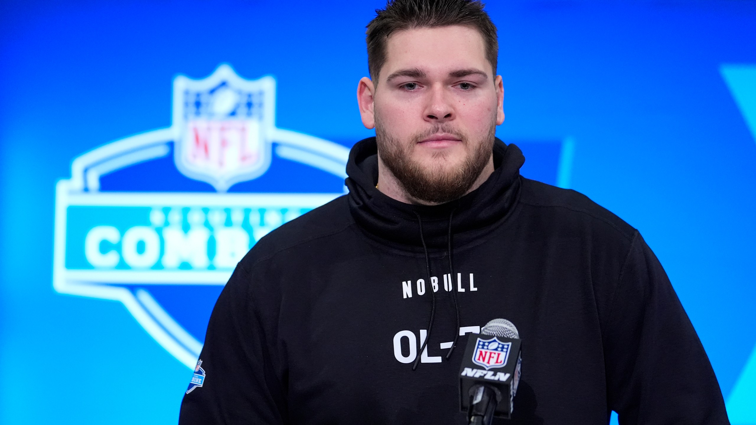 Michigan offensive lineman Zak Zinter speaks during a press conference at the NFL football scouting combine in Indianapolis, Saturday, March 2, 2024. (AP Photo/Michael Conroy)