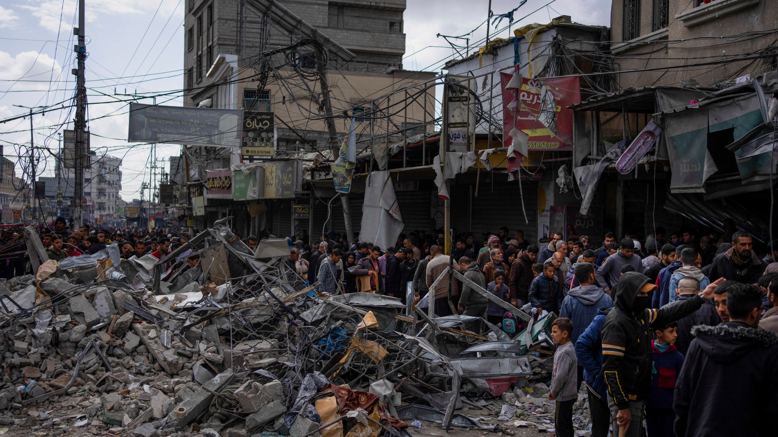 Palestinians check destruction after an Israeli strikea in Rafah, Gaza Strip, Monday, March 4, 2024. (AP Photo/Fatima Shbair)