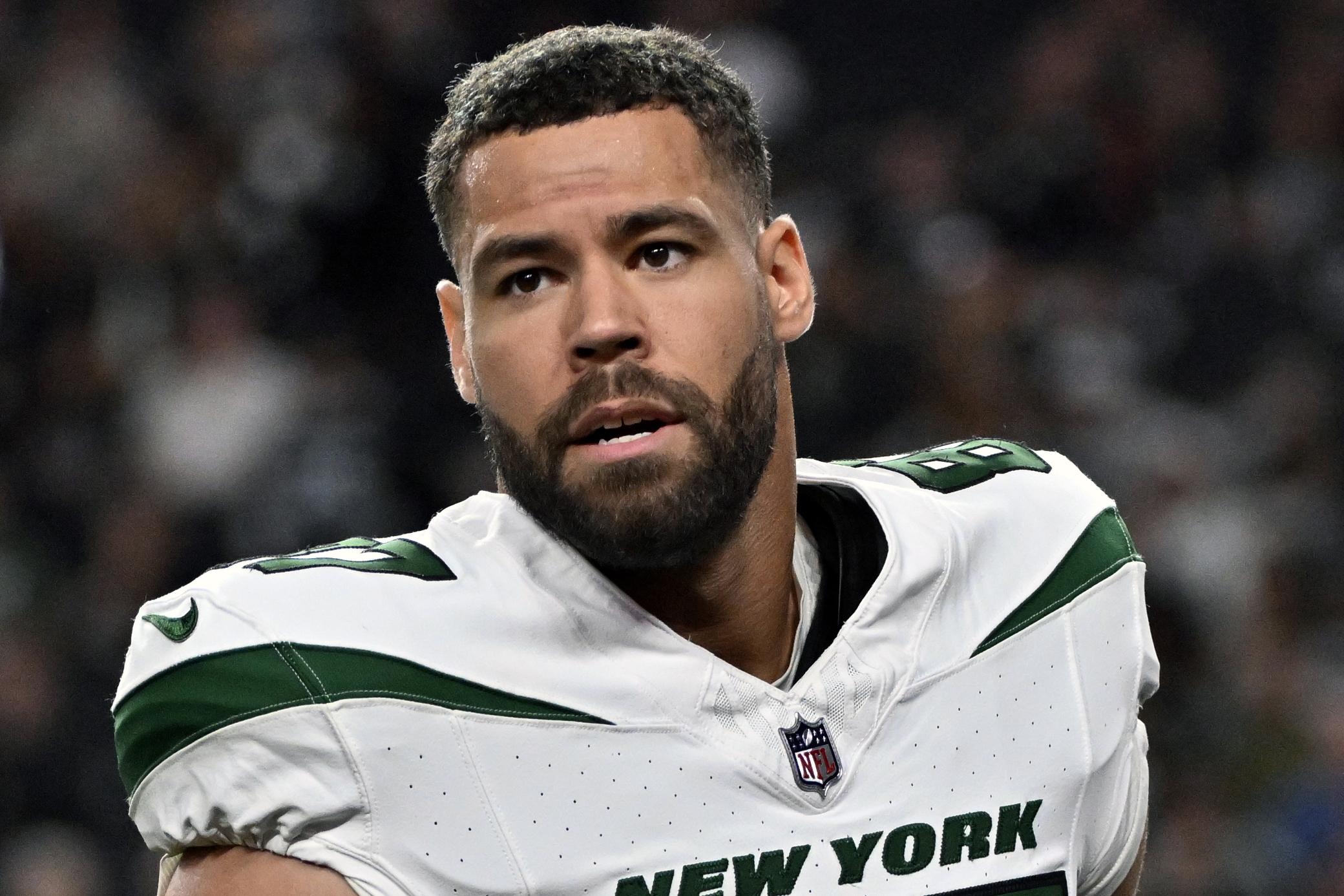 FILE - New York Jets tight end C.J. Uzomah (87) looks on before the start of an NFL football game against the Las Vegas Raiders Sunday, Nov. 12, 2023, in Las Vegas. The New York Jets plan to release veteran tight end C.J. Uzomah, according to a person with knowledge of the decision. The person spoke to The Associated Press on condition of anonymity Tuesday, March 5, 2024, because the Jets had not yet announced the move. (AP Photo/David Becker, File)