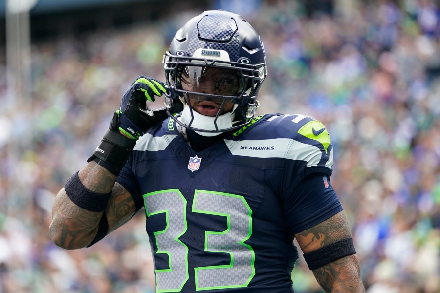 FILE -Seattle Seahawks safety Jamal Adams (33) reacts after a play against the Arizona Cardinals during the second half of an NFL football game, Sunday, Oct. 22, 2023, in Seattle. The Seattle Seahawks' remodel under new coach Mike Macdonald started Tuesday, March 5, 2024 as the team released safeties Jamal Adams and Quandre Diggs, and tight end Will Dissly in moves that will give the team a boost of salary cap space ahead of the start of the new league year. (AP Photo/Lindsey Wasson, File)