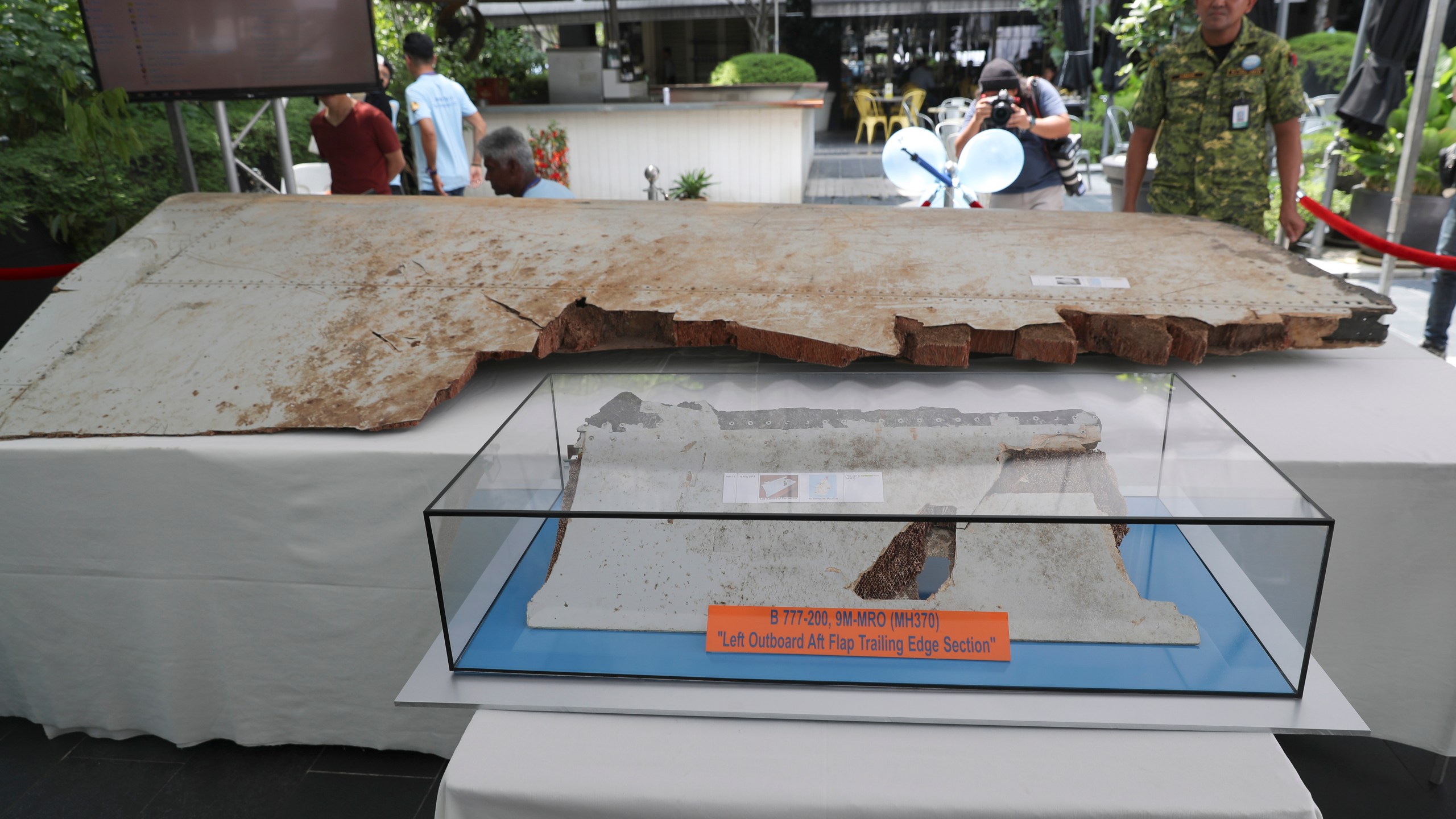 FILE - Debris from the missing Malaysia Airlines Flight MH370 is displayed during a Day of Remembrance for MH370 event in Kuala Lumpur, Malaysia, on March 3, 2019. A decade ago this week, a Malaysia Airlines flight vanished without a trace to become one of aviation’s biggest mystery. Investigators still do not know exactly what happened to the plane and its 239 passengers. (AP Photo/Vincent Thian, File)