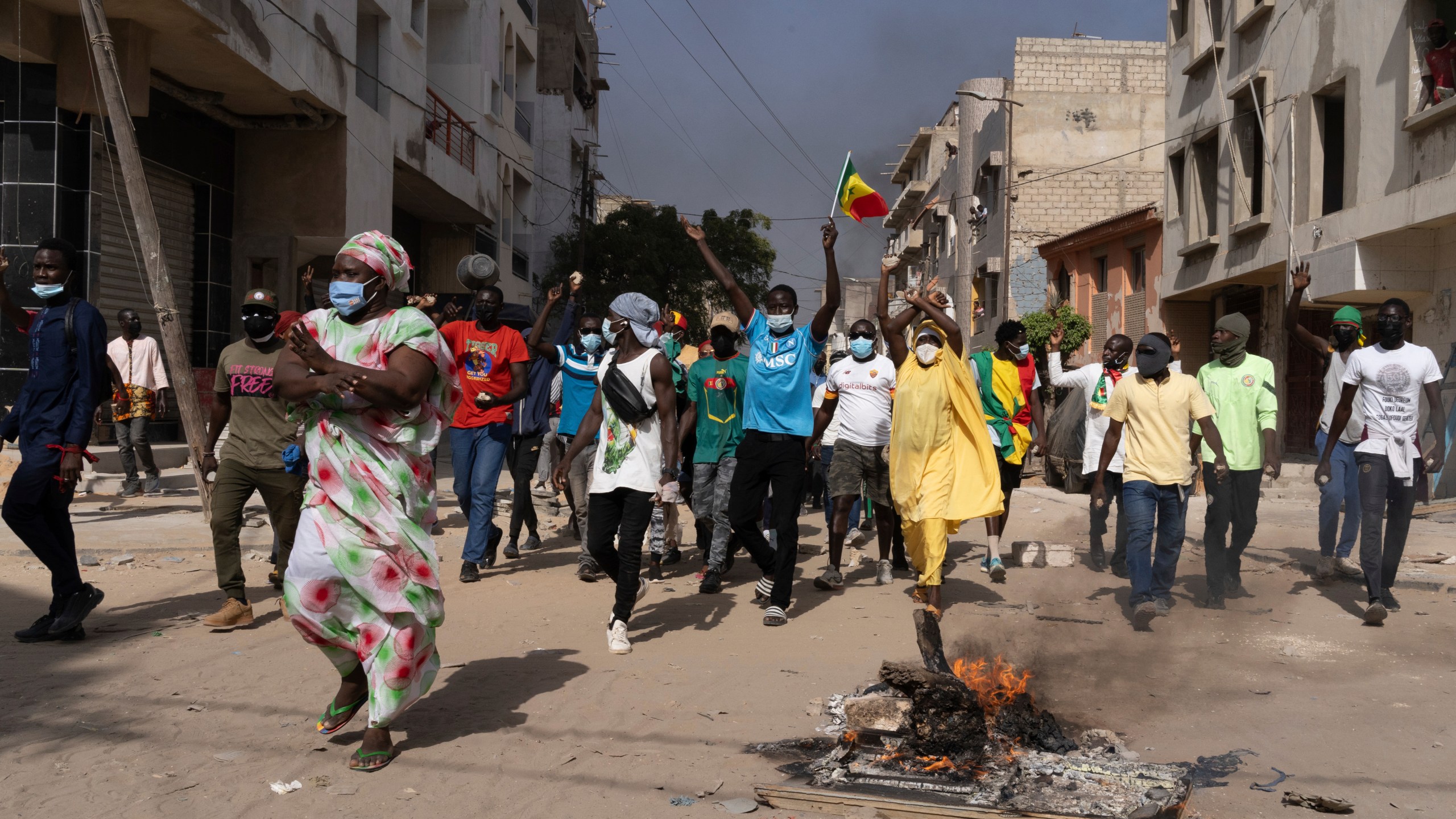 FILE - Demonstrators protest President Macky Sall's decision to postpone the Feb. 25 vote, citing an electoral dispute between the parliament and the judiciary regarding some candidacies in Dakar, Senegal, Friday, Feb. 9, 2024. The Senegalese government has announced March 24, 2024 as the new date for the country’s delayed presidential election. (AP Photo/Stefan Kleinowitz, File)