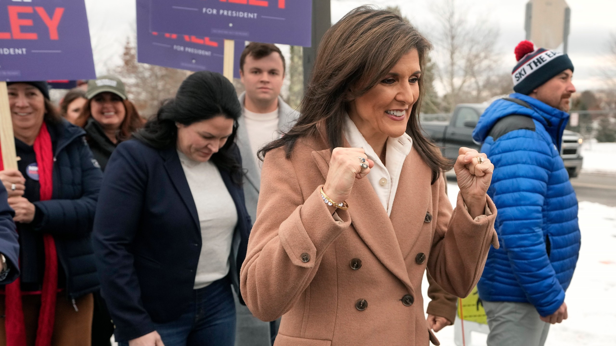 FILE - Republican presidential candidate former U.N. Ambassador Nikki Haley gestures while walking with supporters, Jan. 23, 2024, in Hampton, N.H. Haley has suspended her Republican presidential campaign. The former South Carolina governor ended her White House bid Wednesday, March 6. (AP Photo/Steven Senne, File)