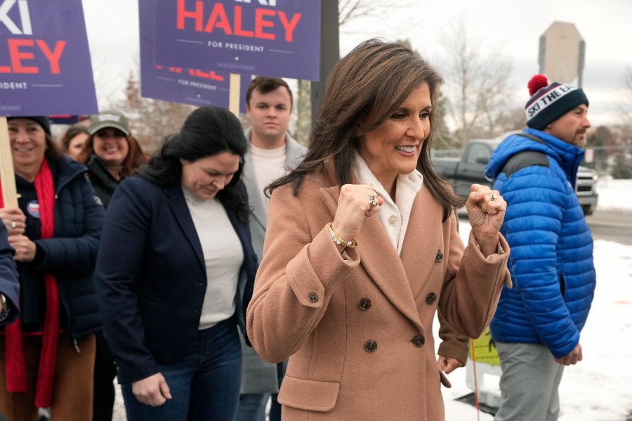 FILE - Republican presidential candidate former U.N. Ambassador Nikki Haley gestures while walking with supporters, Jan. 23, 2024, in Hampton, N.H. Haley has suspended her Republican presidential campaign. The former South Carolina governor ended her White House bid Wednesday, March 6. (AP Photo/Steven Senne, File)