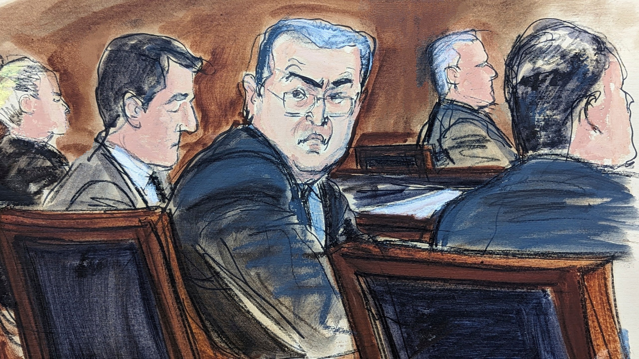 FILE - In this courtroom sketch from federal court in New York, Tuesday, Feb. 20, 2024, former Honduran President Juan Orlando Hernández, seated center at the defense table, turns to looks at prospective jurors during the jury selection process at the start of his trial. Hernández took the witness stand in his defense at his New York trial on Tuesday, March 5, denying that he teamed up with drug dealers to protect them in return for millions of dollars in bribes. (Elizabeth Williams via AP, File)