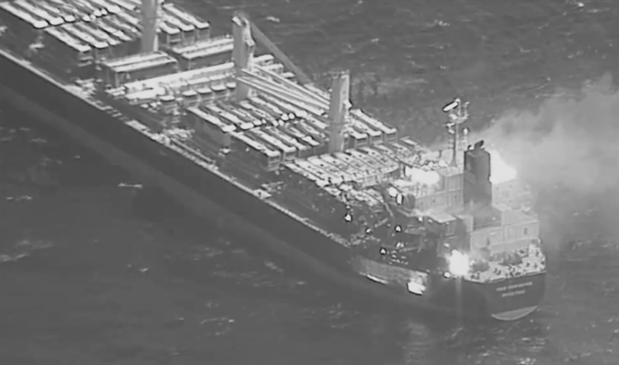 This black-and-white image released by the U.S. military's Central Command shows the fire aboard the bulk carrier True Confidence after a missile attack by Yemen's Houthi rebels in the Gulf of Aden on Wednesday, March 6, 2024. A missile attack by Yemen's Houthi rebels on a commercial ship in the Gulf of Aden on Wednesday killed three of its crew members and forced survivors to abandon the vessel, the U.S. military said. It was the first fatal strike in a campaign of assaults by the Iranian-backed group over Israel's war on Hamas in the Gaza Strip. (U.S. Central Command via AP)