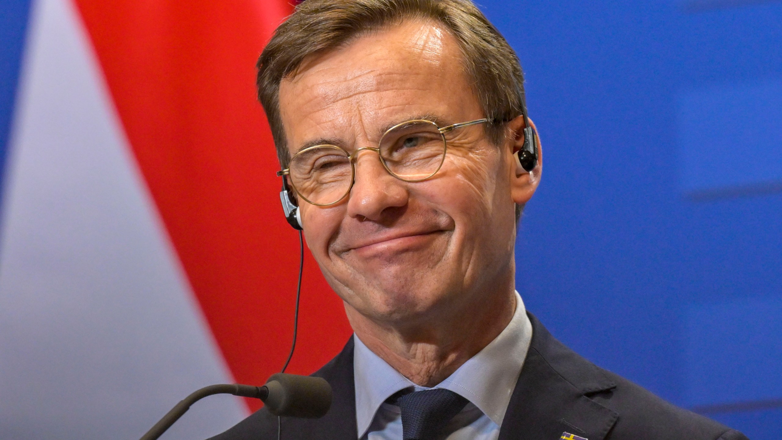 FILE - Sweden's Prime Minister Ulf Kristersson smiles during a news conference in Budapest, Hungary, Feb 23, 2024. (AP Photo/Denes Erdos, File)