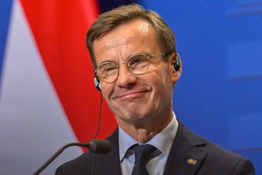 FILE - Sweden's Prime Minister Ulf Kristersson smiles during a news conference in Budapest, Hungary, Feb 23, 2024. (AP Photo/Denes Erdos, File)