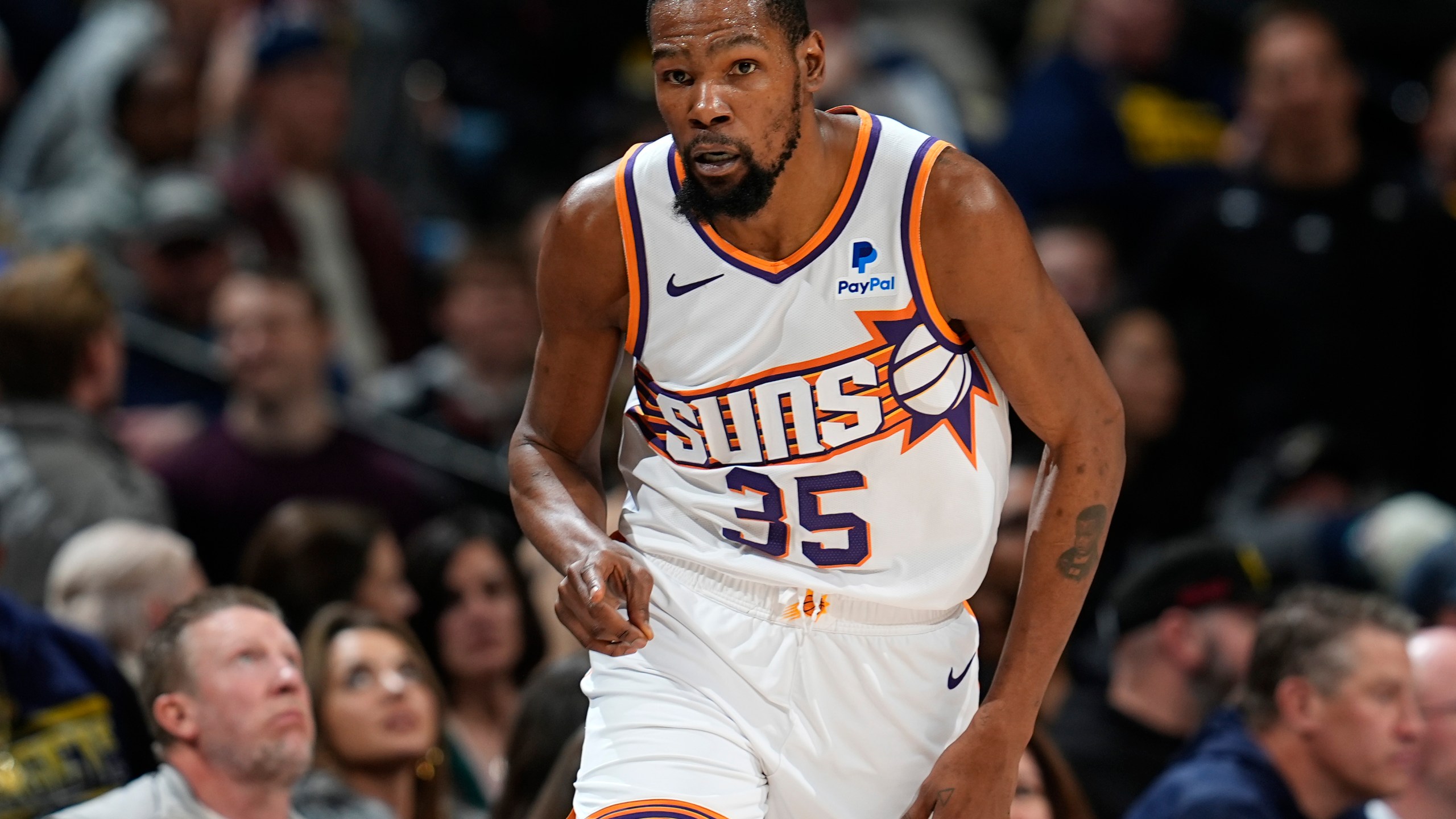 Phoenix Suns forward Kevin Durant gestures after hitting a 3-point basket against the Denver Nuggets in overtime of an NBA basketball game Tuesday, March 5, 2024, in Denver. (AP Photo/David Zalubowski)