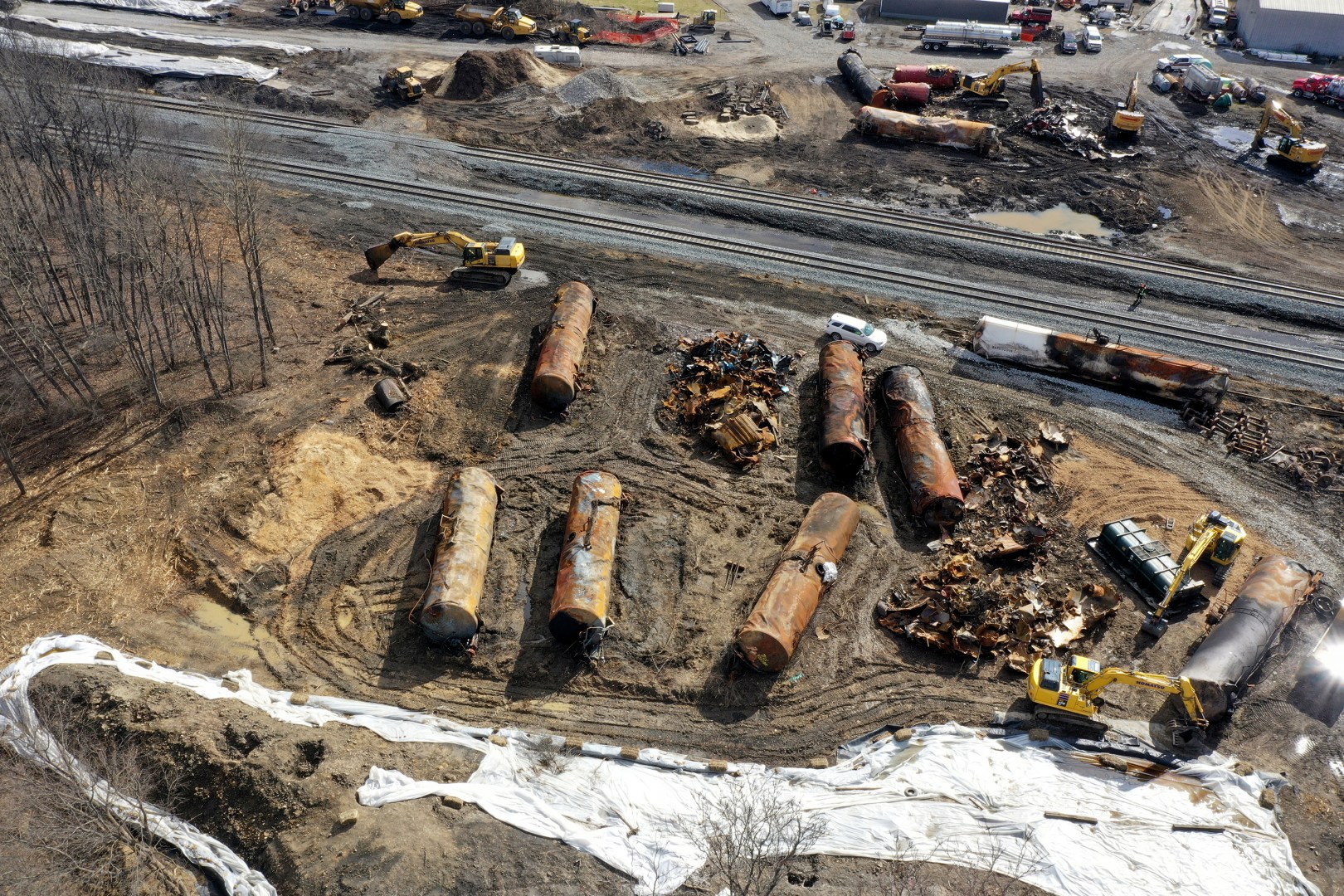 FILE - A view of the scene Friday, Feb. 24, 2023, as the cleanup continues at the site of a Norfolk Southern freight train derailment that happened on Feb. 3 in East Palestine, Ohio. Norfolk Southern alone will be responsible for paying for the cleanup after last year's fiery train derailment in eastern Ohio, a federal judge ruled, Wednesday, March 6, 2024. (AP Photo/Matt Freed, File)