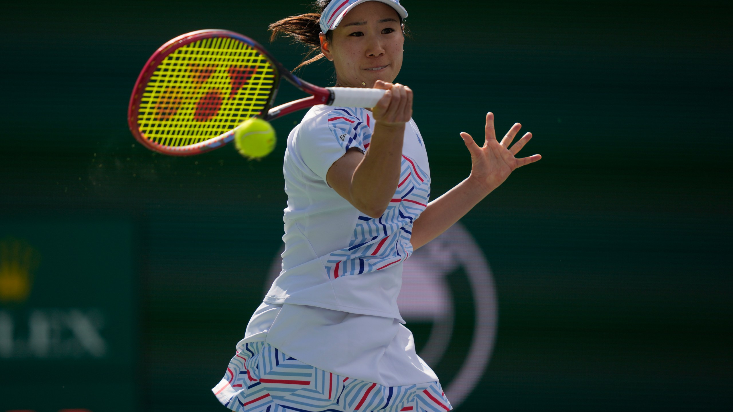 Nao Hibino, of Japan, returns to Venus Williams, of the United States, at the BNP Paribas Open tennis tournament, Thursday, March 7, 2024, in Indian Wells, Calif. (AP Photo/Ryan Sun)