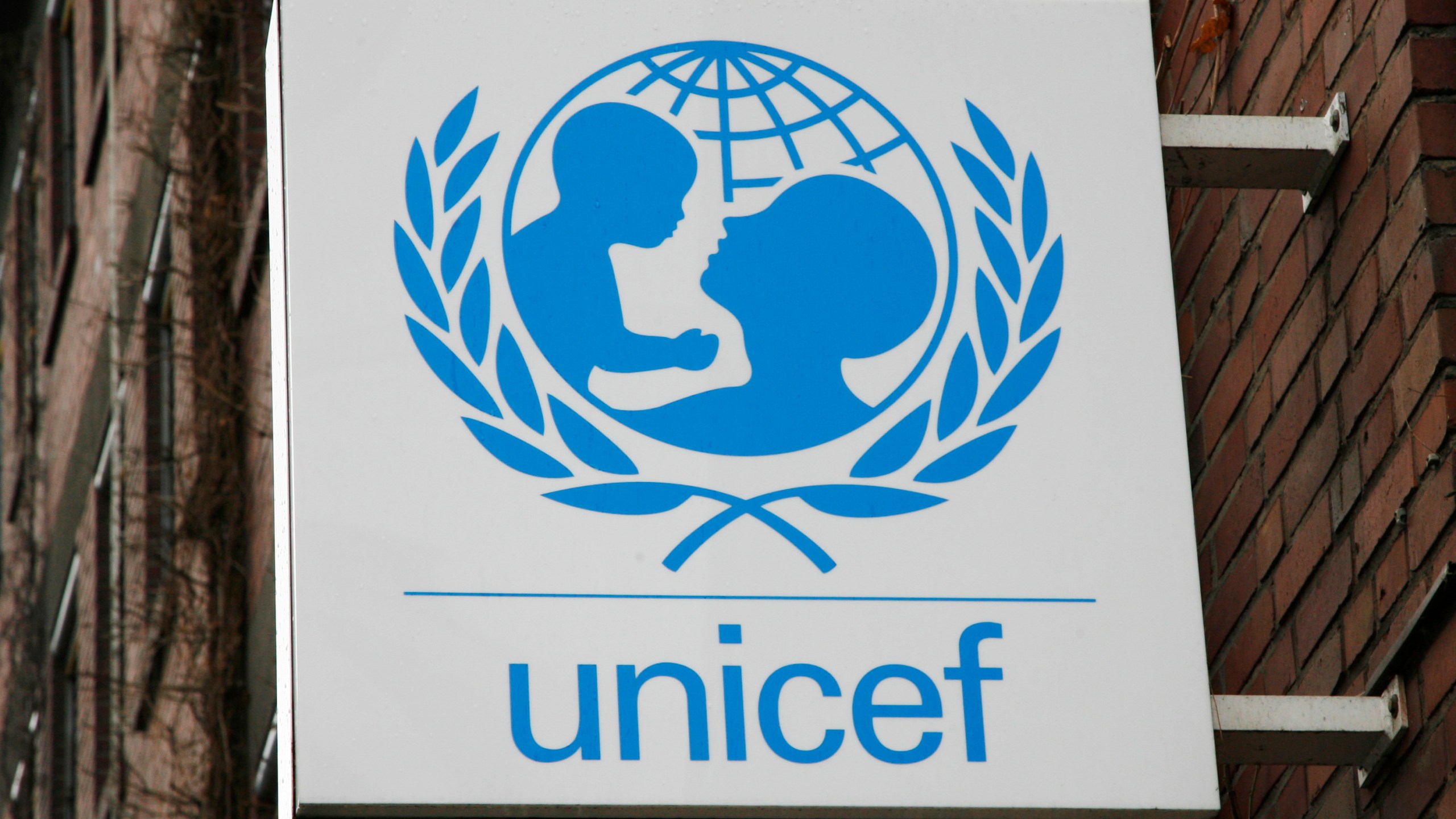 FILE - The UNICEF logo is seen at the German UNICEF headquarters in Cologne, Germany, on Feb. 5, 2008. Over 230 million women and girls have undergone female genital mutilation, most of whom live in Africa, according to a report issued on Friday, March 8, 2024, by the United Nations children's agency. (AP Photo/Hermann J. Knippertz, File)