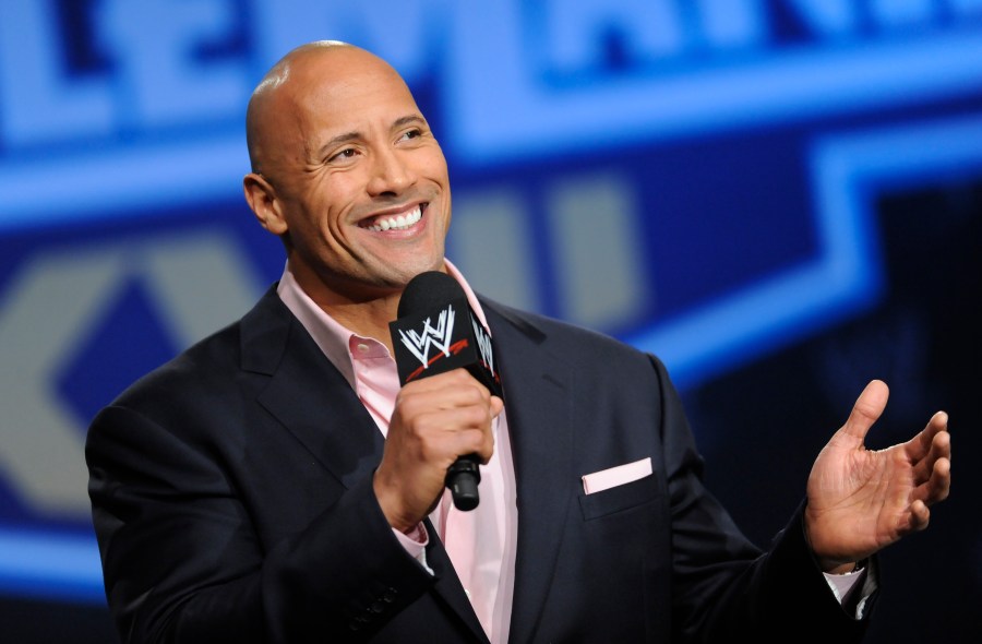 FILE - Actor and former WWE Superstar Dwayne "The Rock" Johnson participates in a news conference on Wednesday, Mar. 30, 2011 in New York. As WWE gears up for its biggest annual premium live event in April 2024, the company continues to harness the power of its social media presence to reach its fans. A key component of that strategy is YouTube, where WWE has hit an important milestone: reaching 100 million subscribers. (AP Photo/Evan Agostini, file)