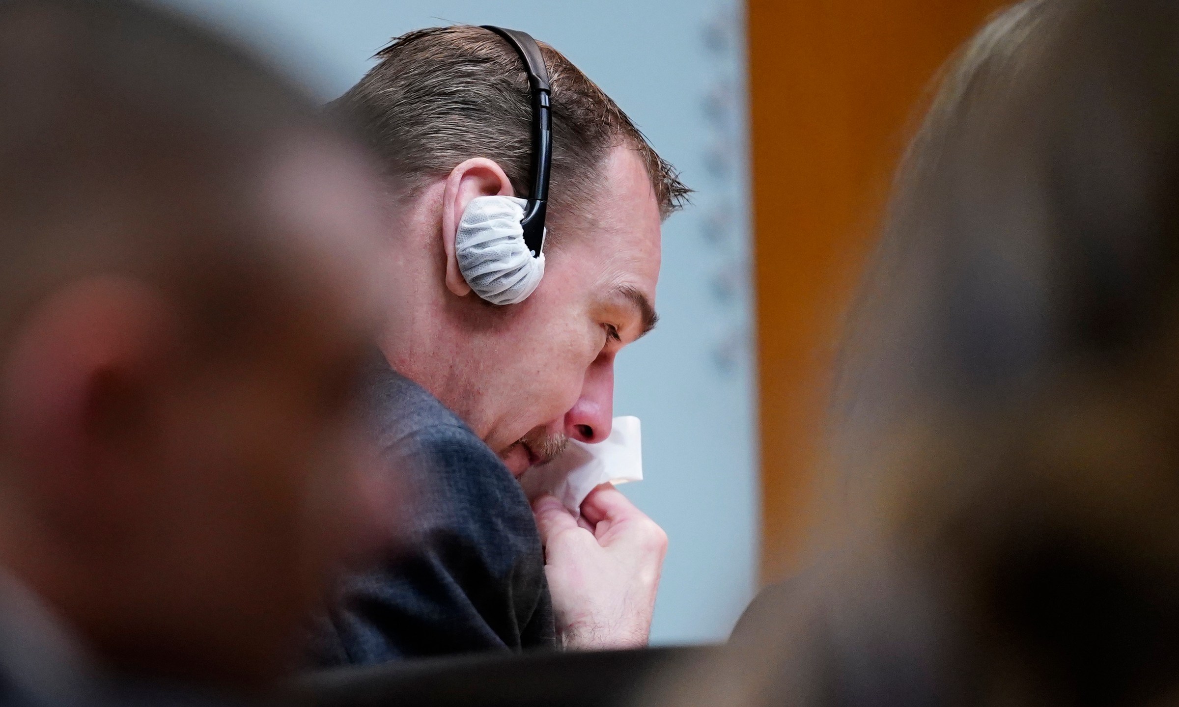James Crumbley becomes emotional during the testimony of Oxford High School educator Molly Darnell as he sits with his attorney Mariell Lehman on Thursday, March. 7, 2024 in Pontiac, Mich. James Crumbley, 47, is charged with four counts of involuntary manslaughter, one for each teenager killed by Ethan Crumbley at Oxford High School in 2021. (Mandi Wright/Detroit Free Press via AP, Pool)
