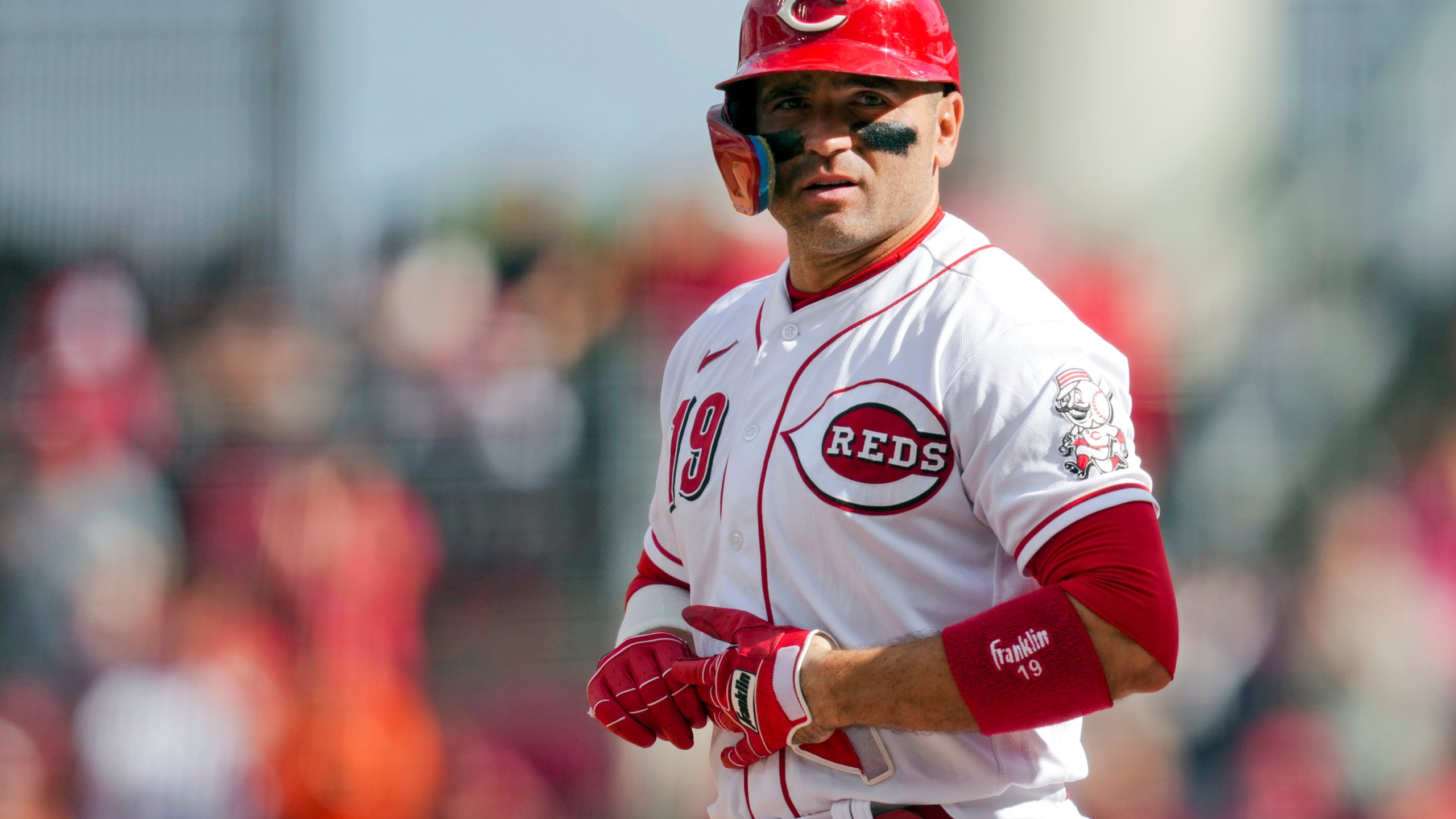 FILE - Cincinnati Reds' Joey Votto stands at first base after hitting a single during a baseball game against the Pittsburgh Pirates in Cincinnati, Sunday, Sept. 24, 2023. The former NL MVP says he has agreed to a minor league contract with his hometown Toronto Blue Jays. Votto, 40, became a free agent last fall after the end of a $251.5 million, 12-year contract with the Cincinnati Reds, his only team over 17 major league season. (AP Photo/Aaron Doster, File)