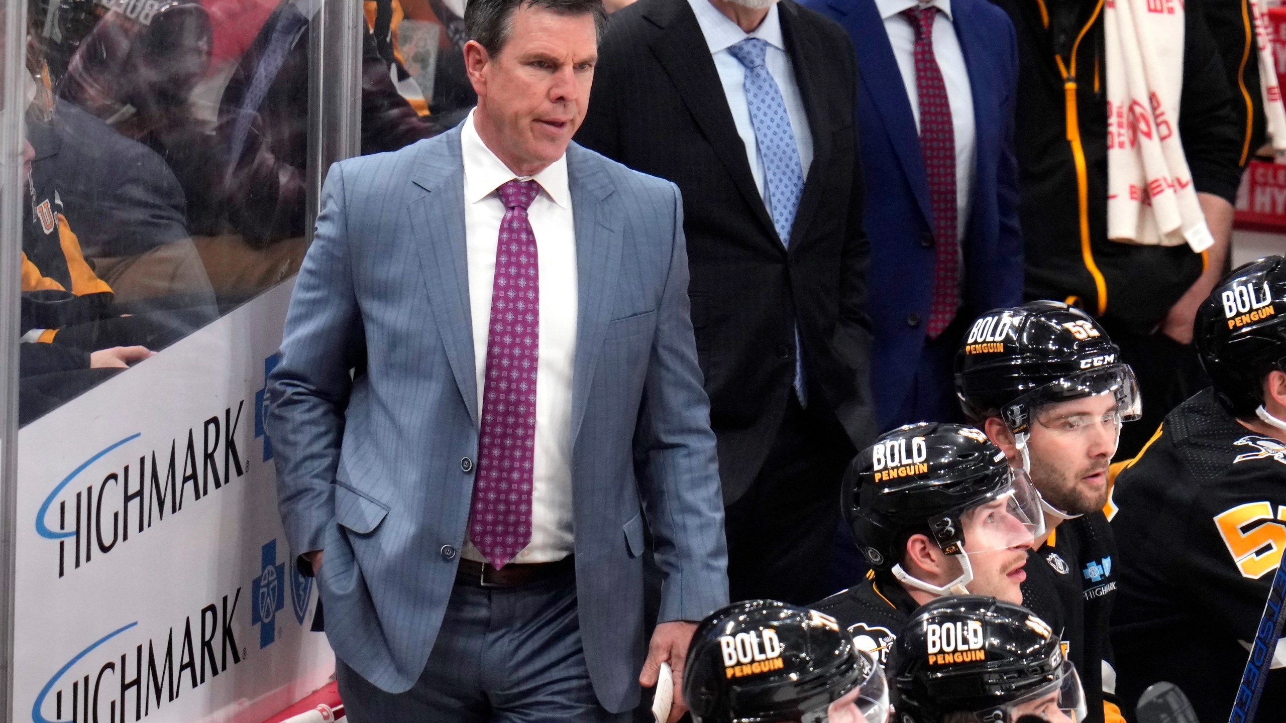 Pittsburgh Penguins head coach Mike Sullivan, left, stands behind his bench during the first period of an NHL hockey game against the Washington Capitals in Pittsburgh, Thursday, March 7, 2024. The Capitals won 6-0. (AP Photo/Gene J. Puskar)