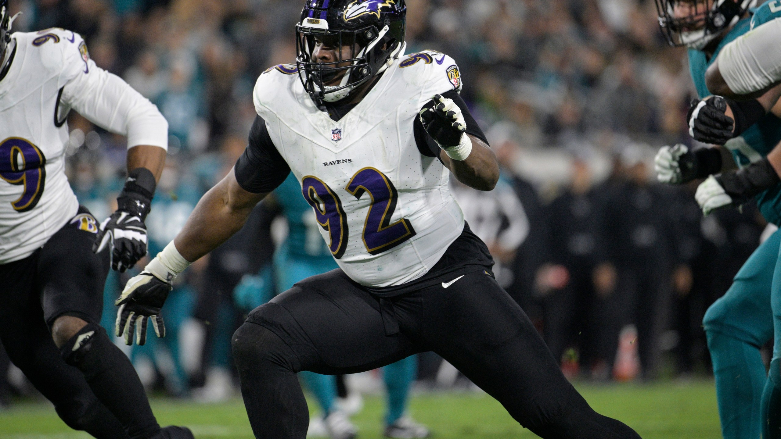 FILE - Baltimore Ravens defensive tackle Justin Madubuike (92) follows a play during the second half of an NFL football game against the Jacksonville Jaguars, Sunday, Dec. 17, 2023, in Jacksonville, Fla. Madubuike had more sacks last season (13) than his first three seasons combined. His breakout season will land him a significant deal, and perhaps a franchise tag. (AP Photo/Phelan M. Ebenhack, File)