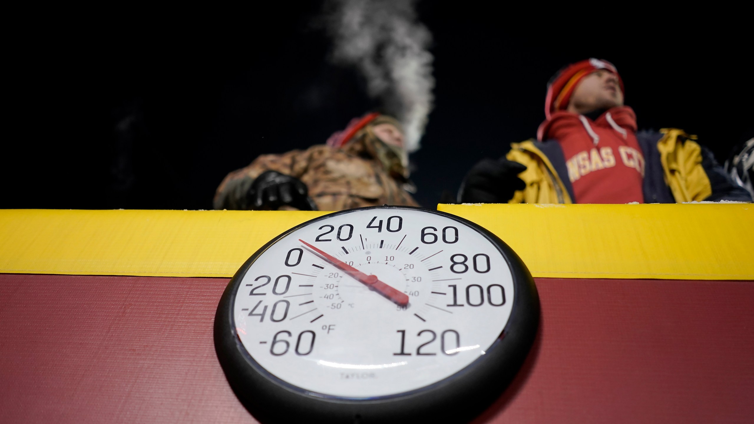 FILE - A gauge displays the temperature on the field at Arrowhead Stadium during the first half of an NFL wild-card playoff football game between the Kansas City Chiefs and the Miami Dolphins, Jan. 13, 2024, in Kansas City, Mo. Some of the people who attended the near-record cold Chiefs playoff game in January had to undergo amputations, a Missouri hospital said Friday, March 8, 2024. Research Medical Center didn’t provide exact numbers but said in a statement Friday that some of the 12 people who had to undergo amputations after the cold snap had been at the game. (AP Photo/Charlie Riedel, File)