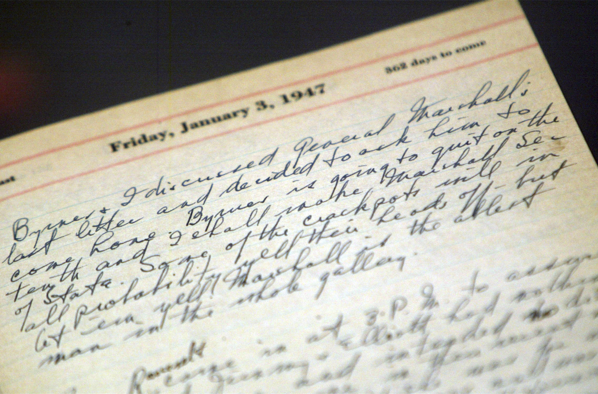 FILE - A portion of a page from a Harry Truman's 1947 presidential diary is shown at the National Archives in Washington, July 10, 2003. Presidents from George Washington to Joe Biden have kept presidential diaries. In them, they confide in themselves, express raw opinions, trace even the humdrum habits of their day and offer insight-on-the-fly on monumental decisions of their time. It's where they may also spill secrets they shouldn't. (AP Photo/Rick Bowmer)