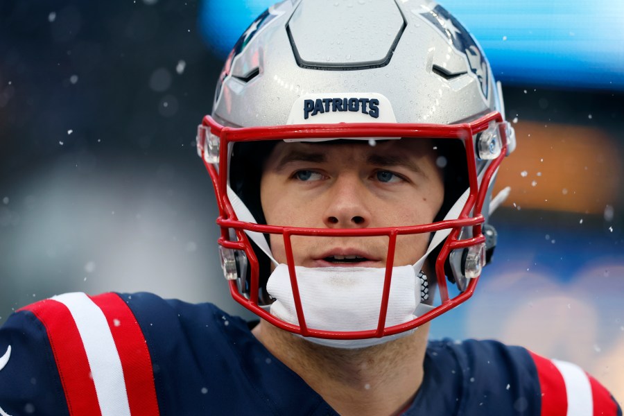 FILE - New England Patriots quarterback Mac Jones prior to an NFL football game against the New York Jets, Jan. 7, 2024, in Foxborough, Mass. A person familiar with negotiations says the Jacksonville Jaguars have agreed to acquire Mac Jones in exchange for a late-round pick in next month's NFL draft. The person spoke to The Associated Press on condition of anonymity Sunday, March 10, 2024 because the trade cannot become official until the new league year begins Wednesday and after Jones passes a physical. (AP Photo/Michael Dwyer)