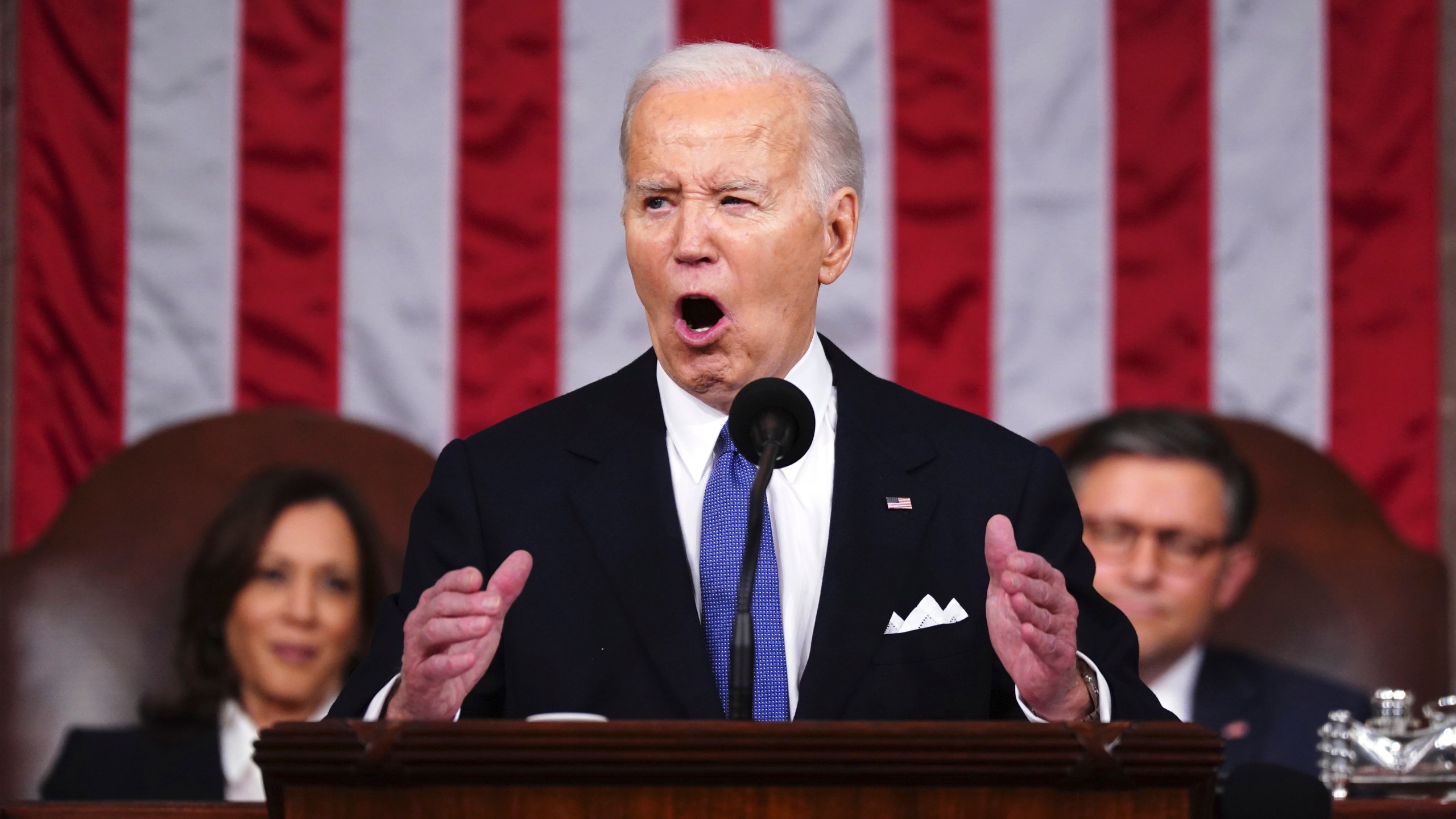 FILE - President Joe Biden delivers the State of the Union address to a joint session of Congress at the Capitol, March 7, 2024, in Washington. Seated at left is Vice President Kamala Harris and at right is House Speaker Mike Johnson, R-La. Biden made abortion and reproductive rights a central theme of his State of the Union speech, but he never mentioned the word "abortion." Pushback over how he addressed the issue is the latest example of Biden's fraught history with the topic. (Shawn Thew/Pool via AP, File)