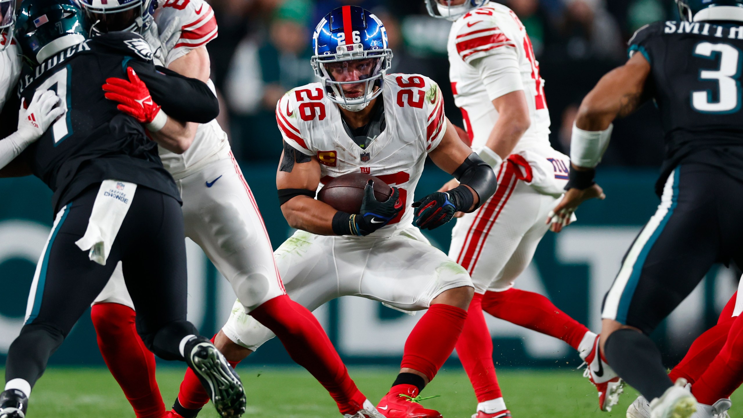 FILE -New York Giants running back Saquon Barkley (26) in action against the Philadelphia Eagles during an NFL football game, Monday, Dec. 25, 2023, in Philadelphia. Star running back Saquon Barkley moved another step closer to free agency Tuesday, Marchy 5, 2024 when the New York Giants elected not to put a franchise tag on the second overall pick in the 2018 NFL draft.(AP Photo/Rich Schultz, File)