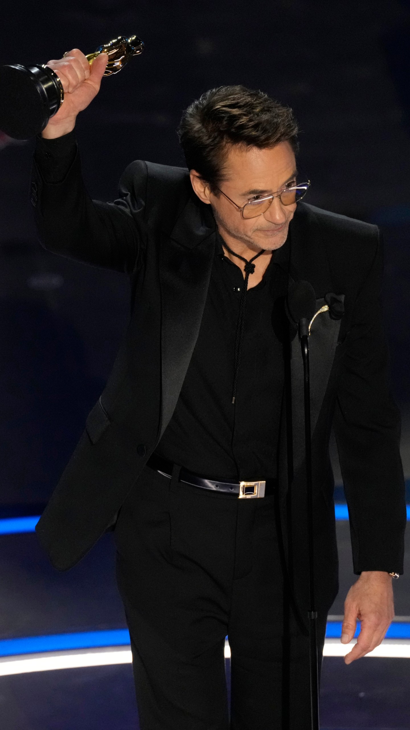 Robert Downey Jr. accepts the award for best performance by an actor in a supporting role for "Oppenheimer" during the Oscars on Sunday, March 10, 2024, at the Dolby Theatre in Los Angeles. (AP Photo/Chris Pizzello)