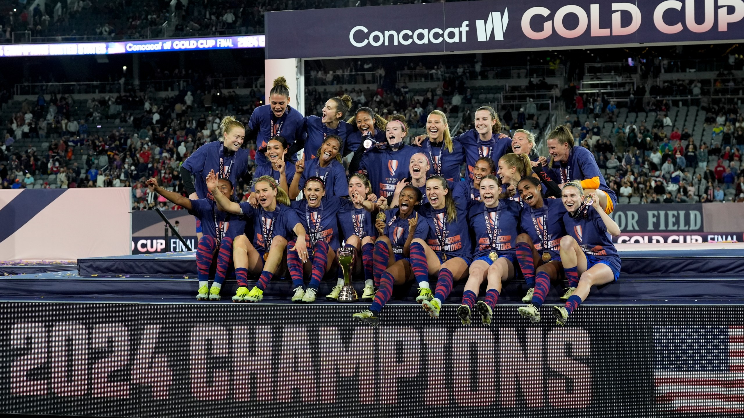 Members of the the United States team celebrate after defeating Brazil in the CONCACAF Gold Cup women's soccer tournament final match, Sunday, March 10, 2024, in San Diego. (AP Photo/Gregory Bull)