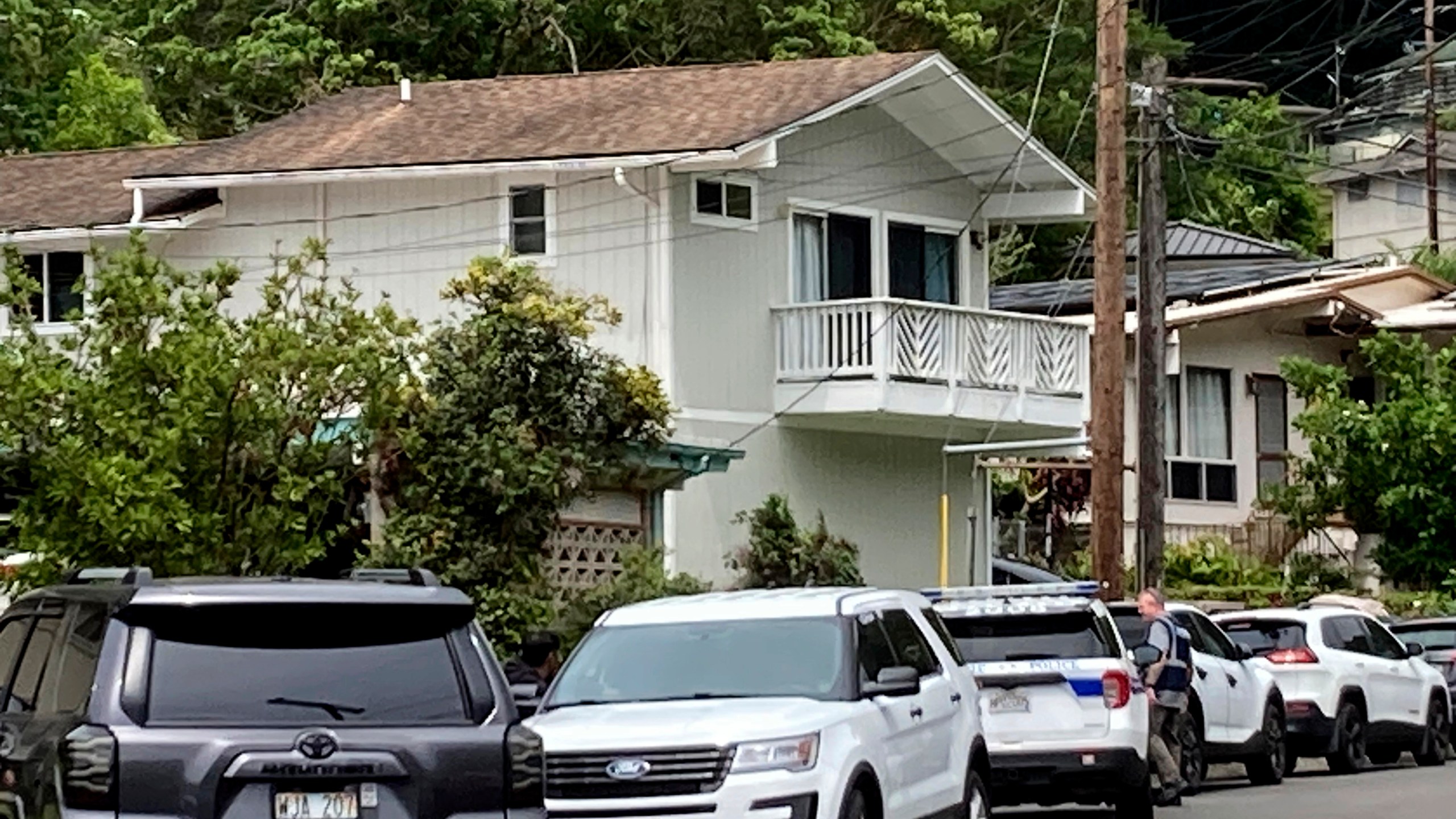 Honolulu police investigate the killings of multiple people at a home in Honolulu's Manoa neighborhood, Sunday, March 10, 2024. (Craig T. Kojima/Honolulu Star-Advertiser via AP)