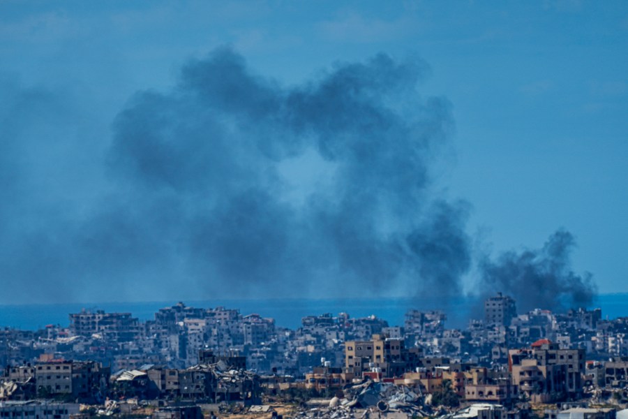 Smoke rises in the northern Gaza Strip, as seen from southern Israel, Sunday, March 10, 2024. (AP Photo/Ariel Schalit)