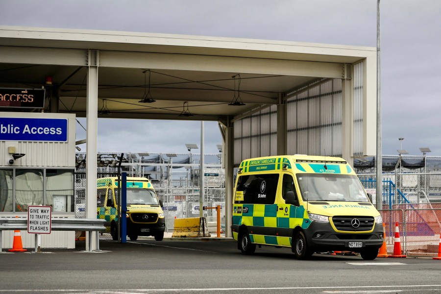 Ambulances leave Auckland International in Auckland, New Zealand, Monday, March 11, 2024. More than 20 people were injured after what officials described as a "technical event" on a Chilean plane traveling from Sydney, Australia to Auckland. (Dean Purcell/New Zealand Herald via AP)