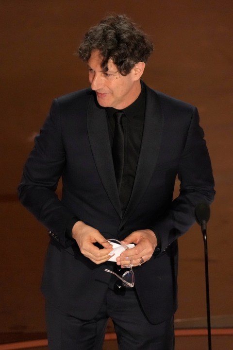 Jonathan Glazer accepts the award for "The Zone of Interest" from the United Kingdom, for best international feature film during the Oscars on Sunday, March 10, 2024, at the Dolby Theatre in Los Angeles. (AP Photo/Chris Pizzello)