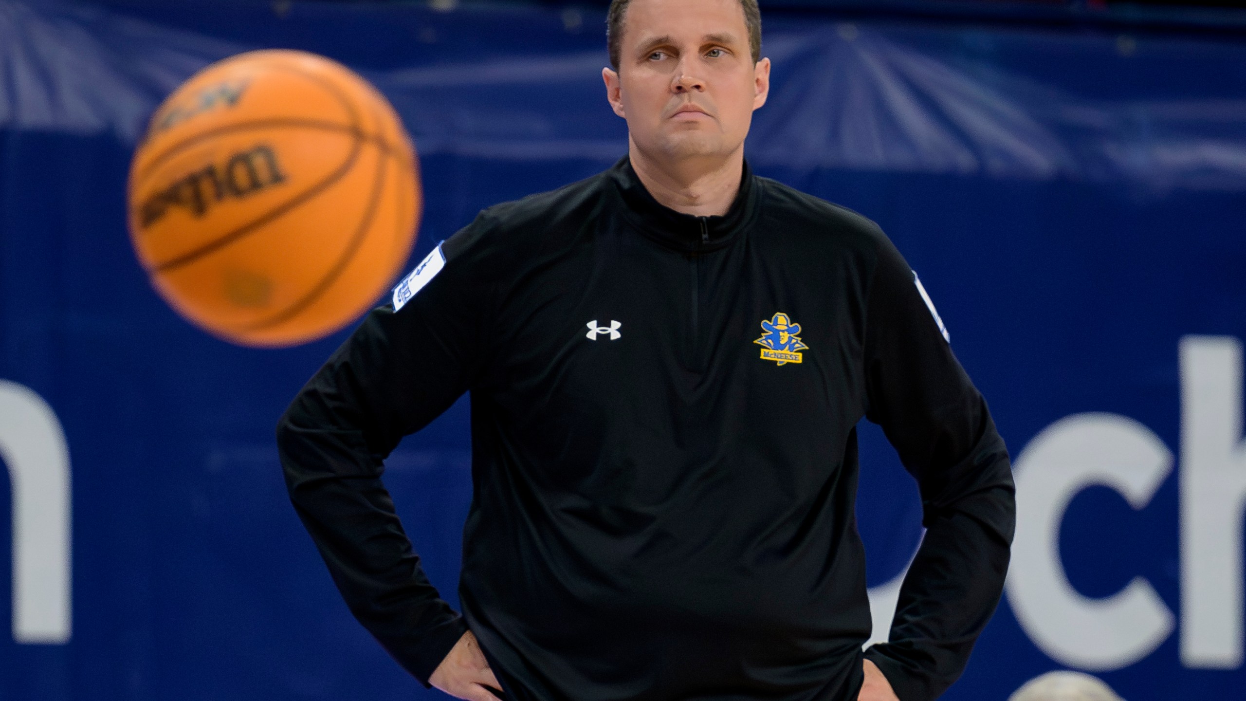 McNeese State coach Will Wade watches the team's NCAA college basketball game against New Orleans in New Orleans, Wednesday, March 6, 2024. Wade was suspended for the first 10 games of the 2023–24 season by the NCAA but the team went to a 28-3 record and finished first in the Southland Conference. (AP Photo/Matthew Hinton)