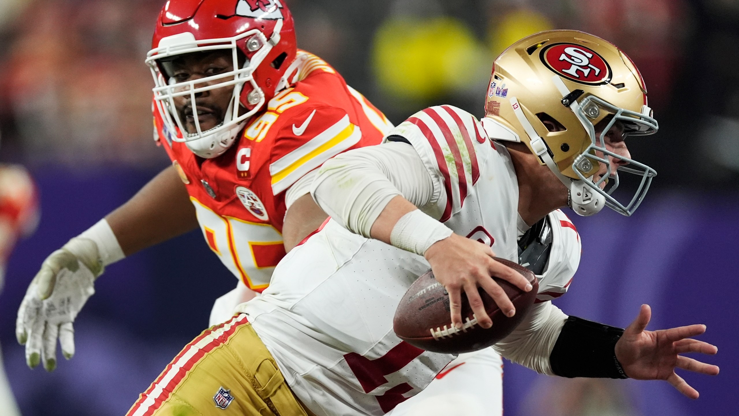 Kansas City Chiefs defensive tackle Chris Jones (95) chases San Francisco 49ers quarterback Brock Purdy (13) during the second half of the NFL Super Bowl 58 football game Sunday, Feb. 11, 2024, in Las Vegas. (AP Photo/George Walker IV)