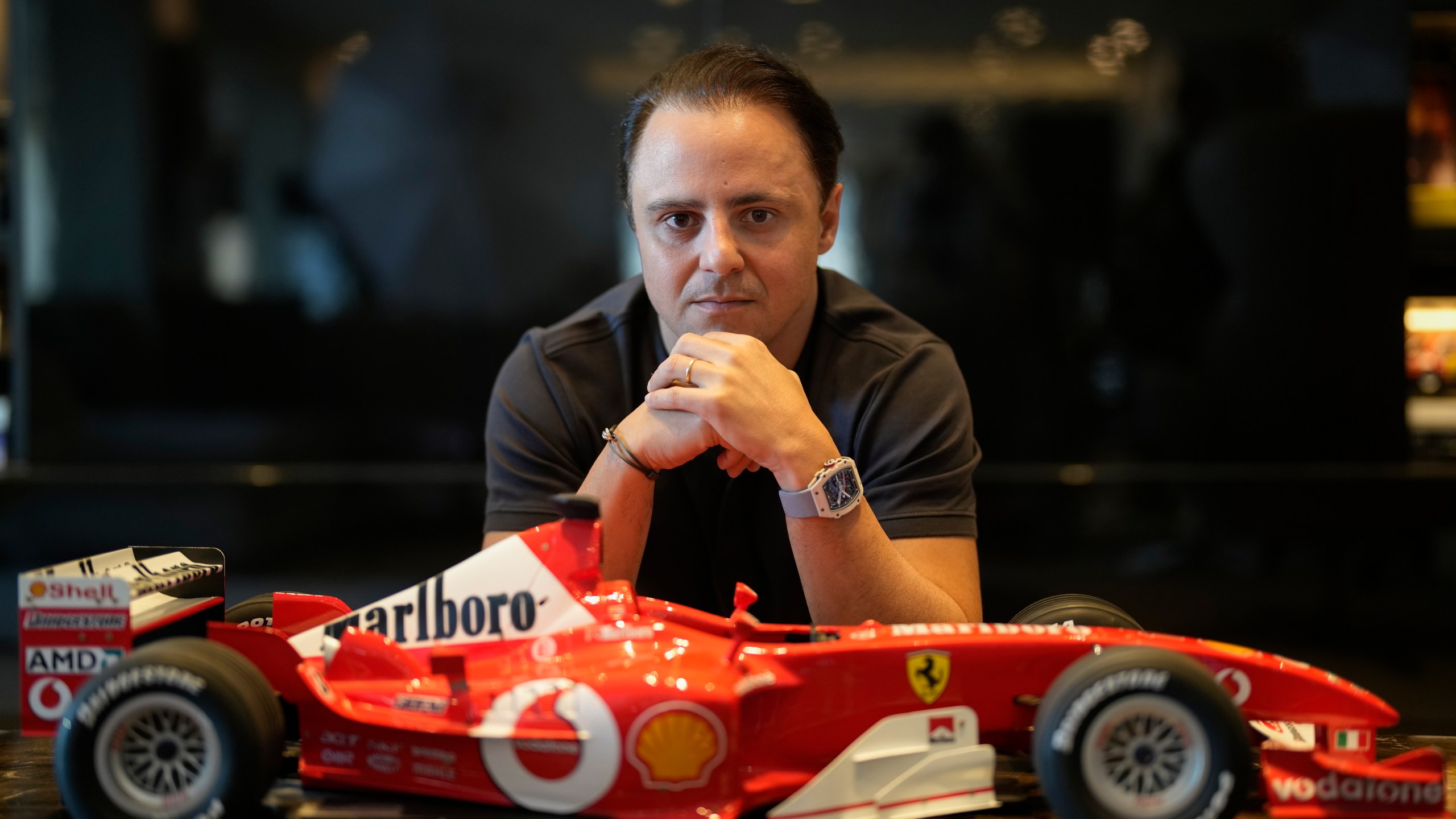 FILE - Former Formula One driver Felipe Massa poses for a photo at his home in Sao Paulo, Brazil, Aug. 31, 2023. Massa said on March 11, 2024, that he filed a lawsuit in a London court against auto racing's governing body FIA, series owner Formula One Management (FOM) and Bernie Ecclestone amid his attempt to claim the 2008 title. (AP Photo/Andre Penner, File)