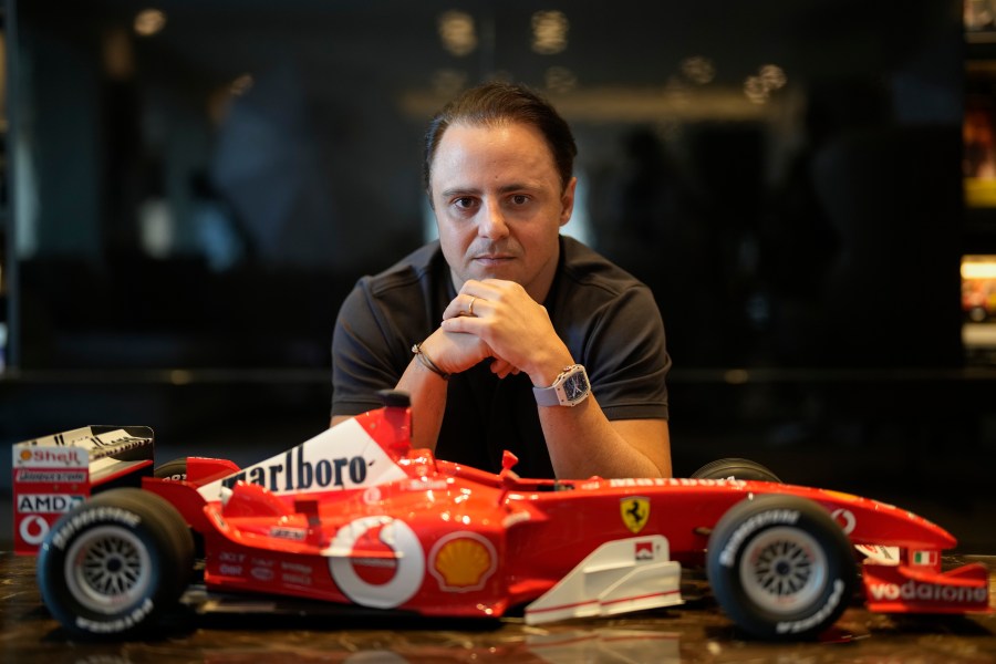 FILE - Former Formula One driver Felipe Massa poses for a photo at his home in Sao Paulo, Brazil, Aug. 31, 2023. Massa said on March 11, 2024, that he filed a lawsuit in a London court against auto racing's governing body FIA, series owner Formula One Management (FOM) and Bernie Ecclestone amid his attempt to claim the 2008 title. (AP Photo/Andre Penner, File)