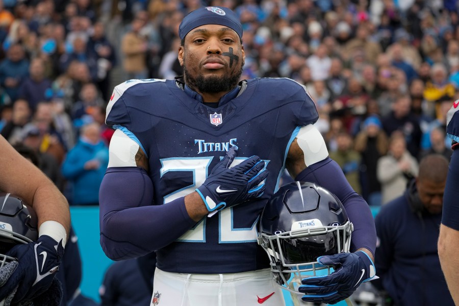 FILE -Tennessee Titans running back Derrick Henry stands for the national anthem before an NFL football game against the Jacksonville Jaguars, Sunday, Jan. 7, 2024, in Nashville, Tenn. Derrick Henry is back in the gym, eager to prove turning 30 is just a number that shouldn’t affect the four-time Pro Bowl running back’s value on the NFL's open market.(AP Photo/George Walker IV, File)