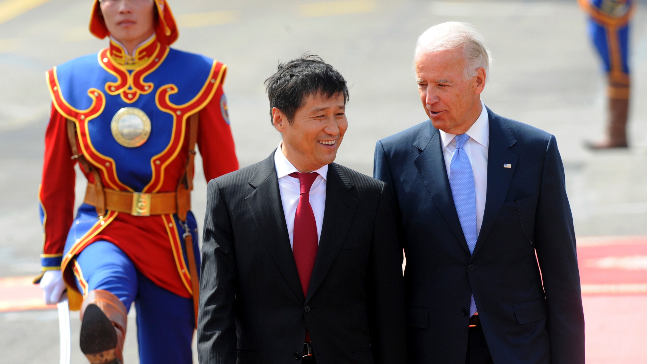FILE - U.S. Vice President Joe Biden, right, shares a light moment with Mongolian Prime Minister Sukhbaatar Batbold in Ulan Bator, Mongolia, Aug. 22, 2011. The release of a transcript of Biden's interview with prosecutors investigating his handling of classified documents offers a rare window into the day-to-day life for the president. One question morphed into a well-worn tale of that one time he "embarrassed the hell" out of the leader of Mongolia. (AP Photo/Goh Chai Hin, Pool)