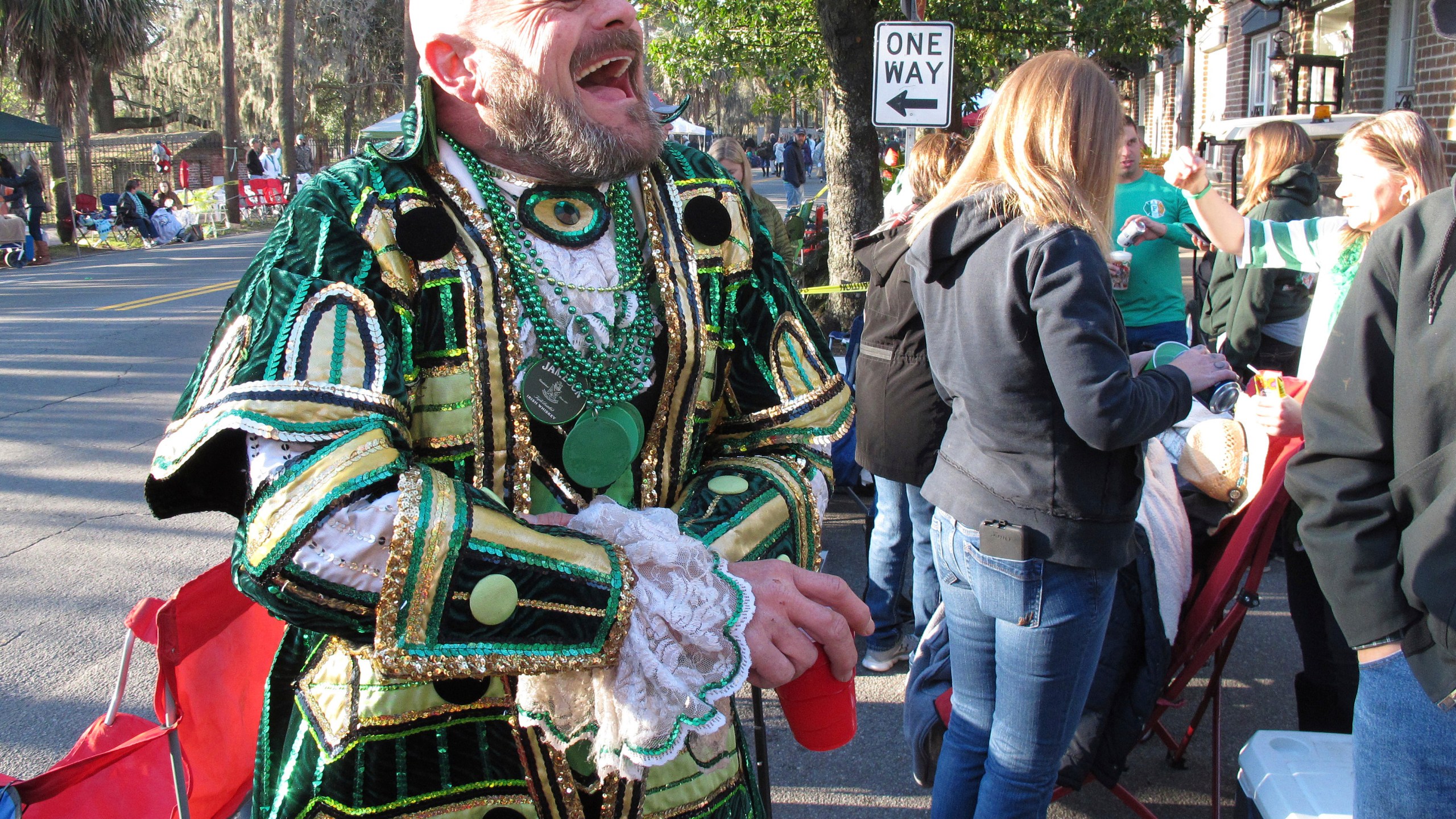 FILE - Brian Welzenbach laughs with friends, March 17, 2017, while celebrating St. Patrick's Day in Savannah, Ga. Savannah, Georgia's oldest city, is planning a supersized celebration as it marks the 200th anniversary of its beloved St. Patrick's Day parade. City Manager Jay Melder says he's expecting historic crowds for the Irish-themed parade Saturday, March 16, 2024. (AP Photo/Russ Bynum, file)