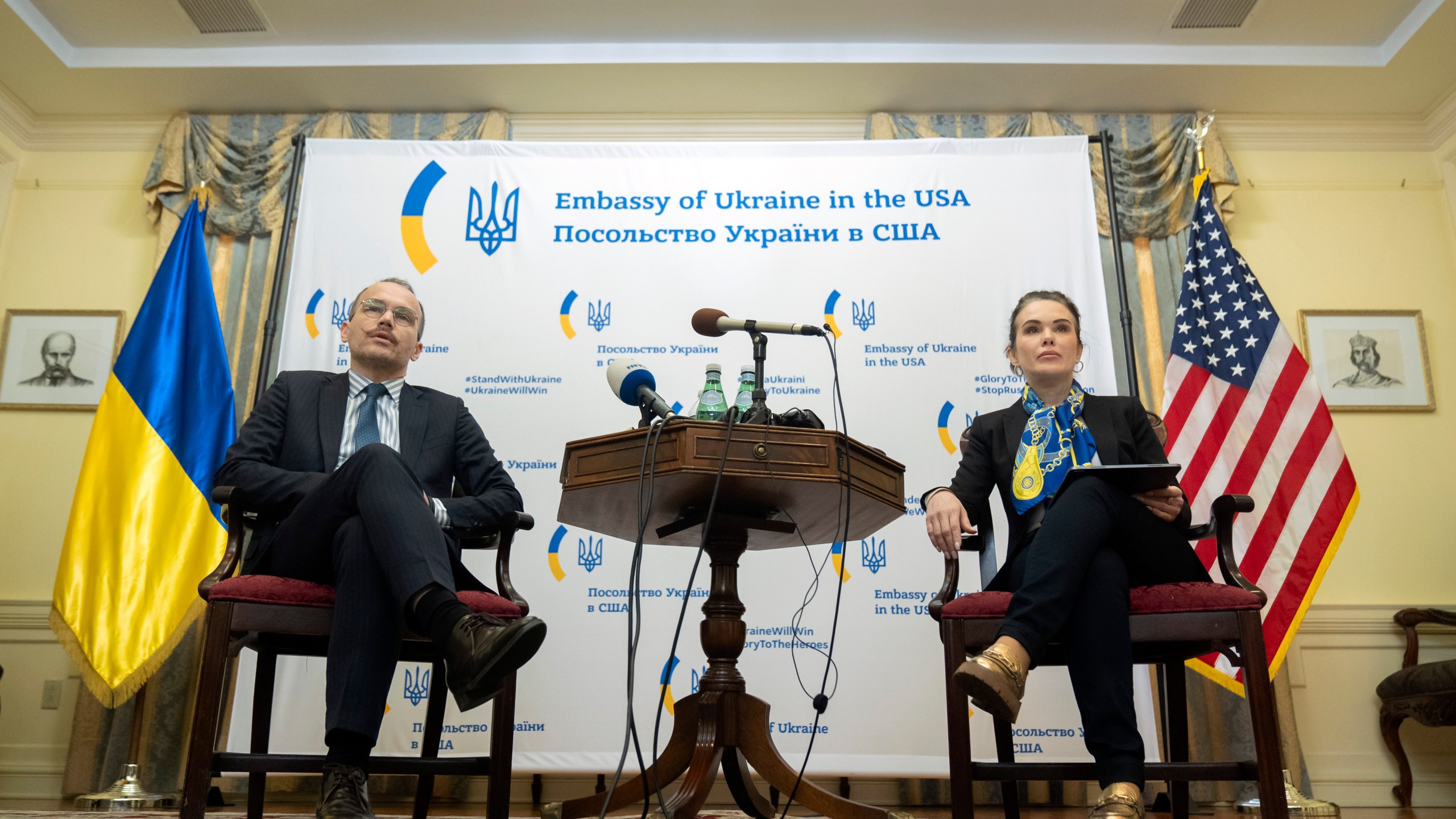 Ukraine's Minister of Justice Denys Maliuska, left, and Deputy Minister of Justice Iryna Mudra attend a press conference at the Embassy of Ukraine on Wednesday, March 13, 2024, in Washington. (AP Photo/Mark Schiefelbein)