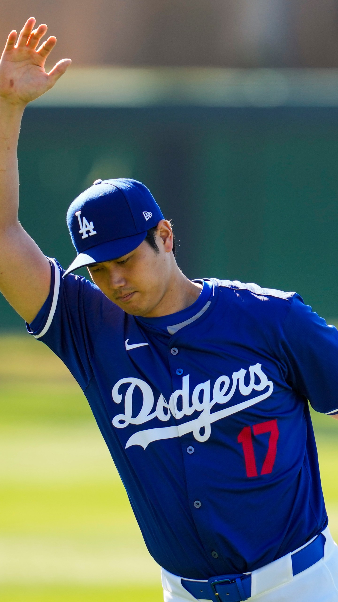 FILE - Los Angeles Dodgers designated hitter Shohei Ohtani participates in spring training baseball workouts at Camelback Ranch in Phoenix, Wednesday, Feb. 14, 2024. Ohtani has dodged questions about his second elbow surgery. (AP Photo/Ashley Landis, File)