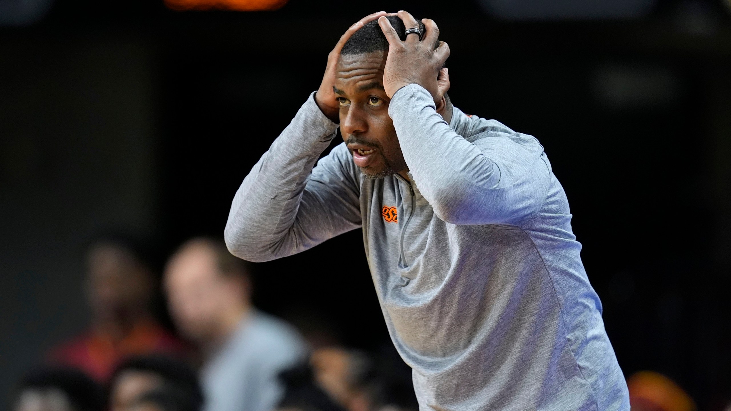 FILE - Oklahoma State head coach Mike Boynton reacts to a call during the first half of an NCAA college basketball game against Iowa State, Saturday, Jan. 13, 2024, in Ames, Iowa. Oklahoma State announced Thursday, March 14, 2024, that it has fired men’s basketball coach Mike Boynton. (AP Photo/Charlie Neibergall, File)