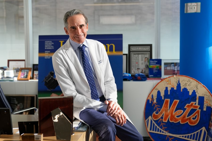 Dr. David Altchek poses in his office in New York, Thursday, Feb. 29, 2024. (AP Photo/Seth Wenig)