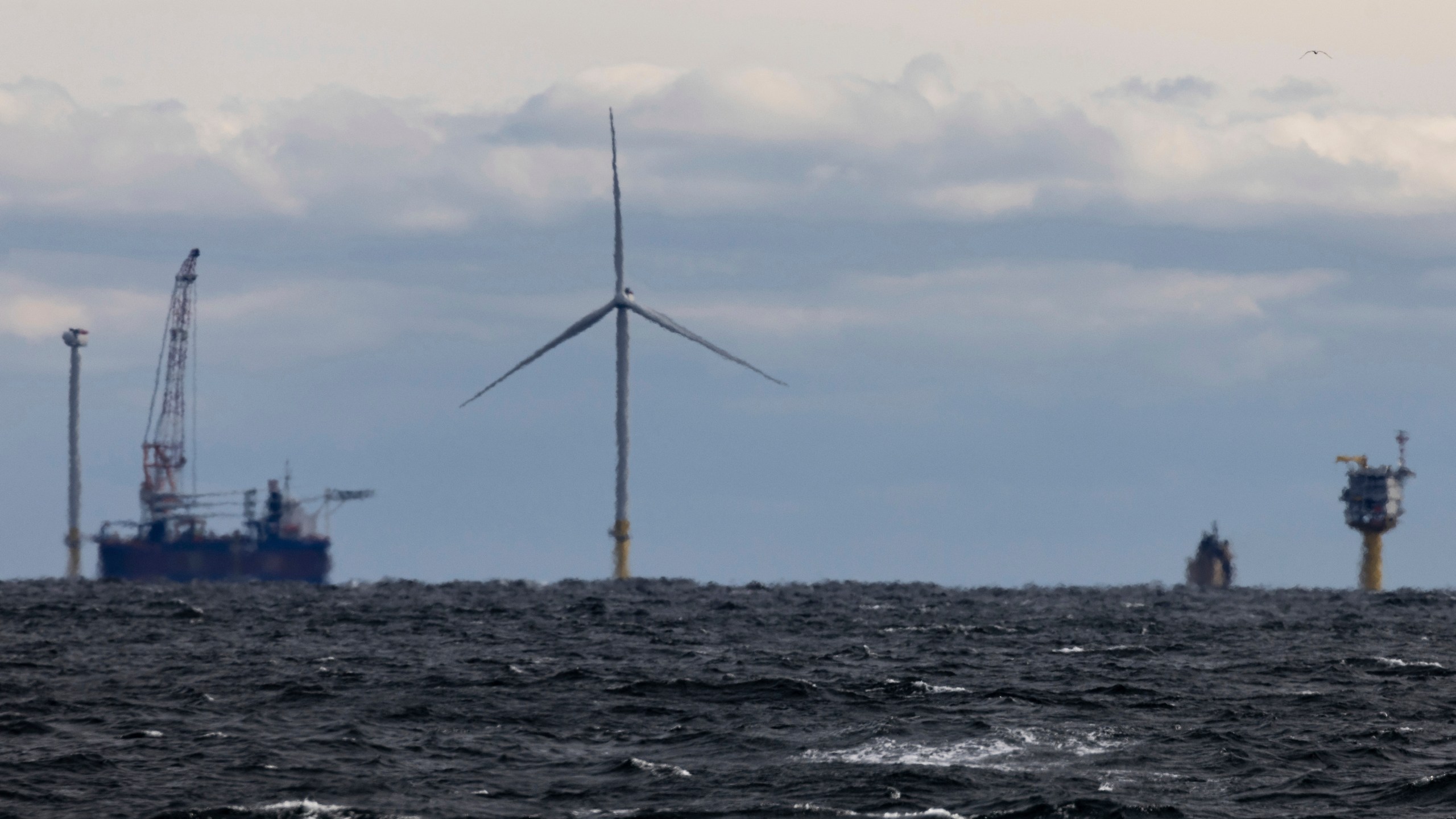FILE - The first operating South Fork Wind farm turbine, Thursday, Dec. 7, 2023, stands east of Montauk Point, N.Y. South Fork Wind, America's first commercial-scale offshore wind farm, is officially open. (AP Photo/Julia Nikhinson, File)