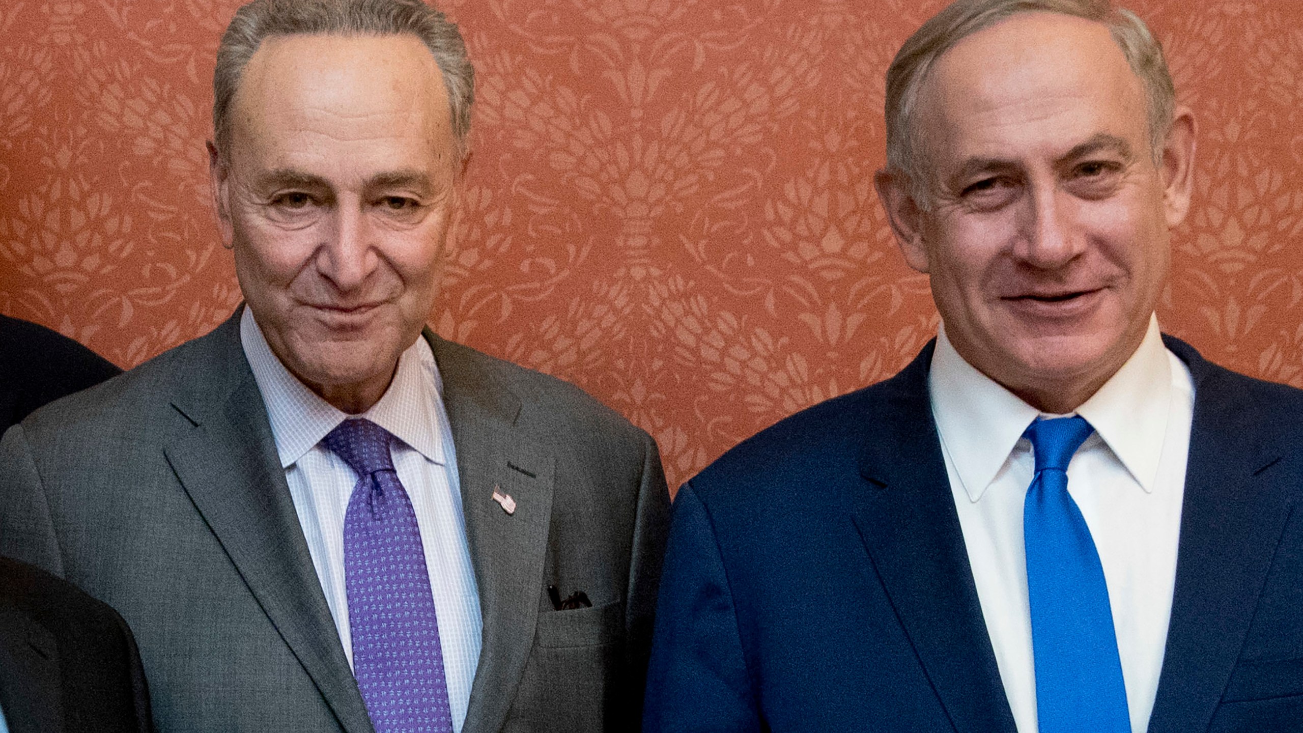 FILE - Israeli Prime Minister Benjamin Netanyahu, right, poses for a picture with Senate Minority Leader Chuck Schumer of New York, on Capitol Hill in Washington, Feb. 15, 2017. Schumer is calling on Israel to hold new elections. Schumer says he believes Israeli Prime Minister Benjamin Netanyahu has “lost his way” amid the Israeli bombardment of Gaza and a growing humanitarian crisis there. Schumer is the first Jewish majority leader in the Senate and the highest-ranking Jewish official in the U.S.. (AP Photo/Manuel Balce Ceneta, File)
