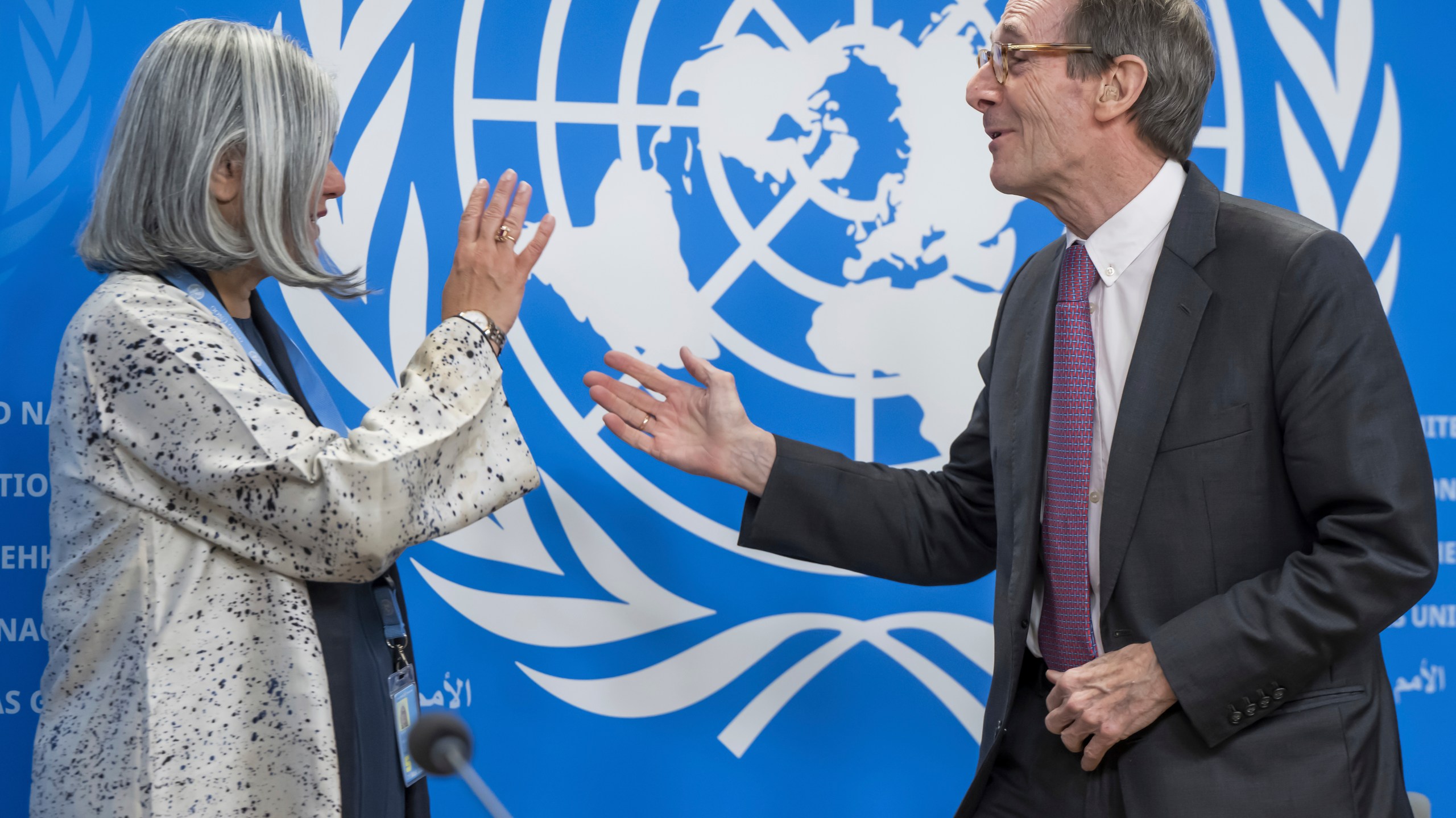 Vrinda Grover, left, Commissioner and Erik Mose, right, Chair of the Independent International Commission of Inquiry on Ukraine, greet each other as they speak about the Commissioners comprehensive report to Human Rights Council, during a press conference at the European headquarters of the United Nations in Geneva, Switzerland, Friday, March 15, 2024. U.N.-backed human rights experts said Friday they have gathered new evidence of “horrific” torture of Ukrainian prisoners of war by their Russian jailers, saying such practices could amount to war crimes. (Martial Trezzini/Keystone via AP)