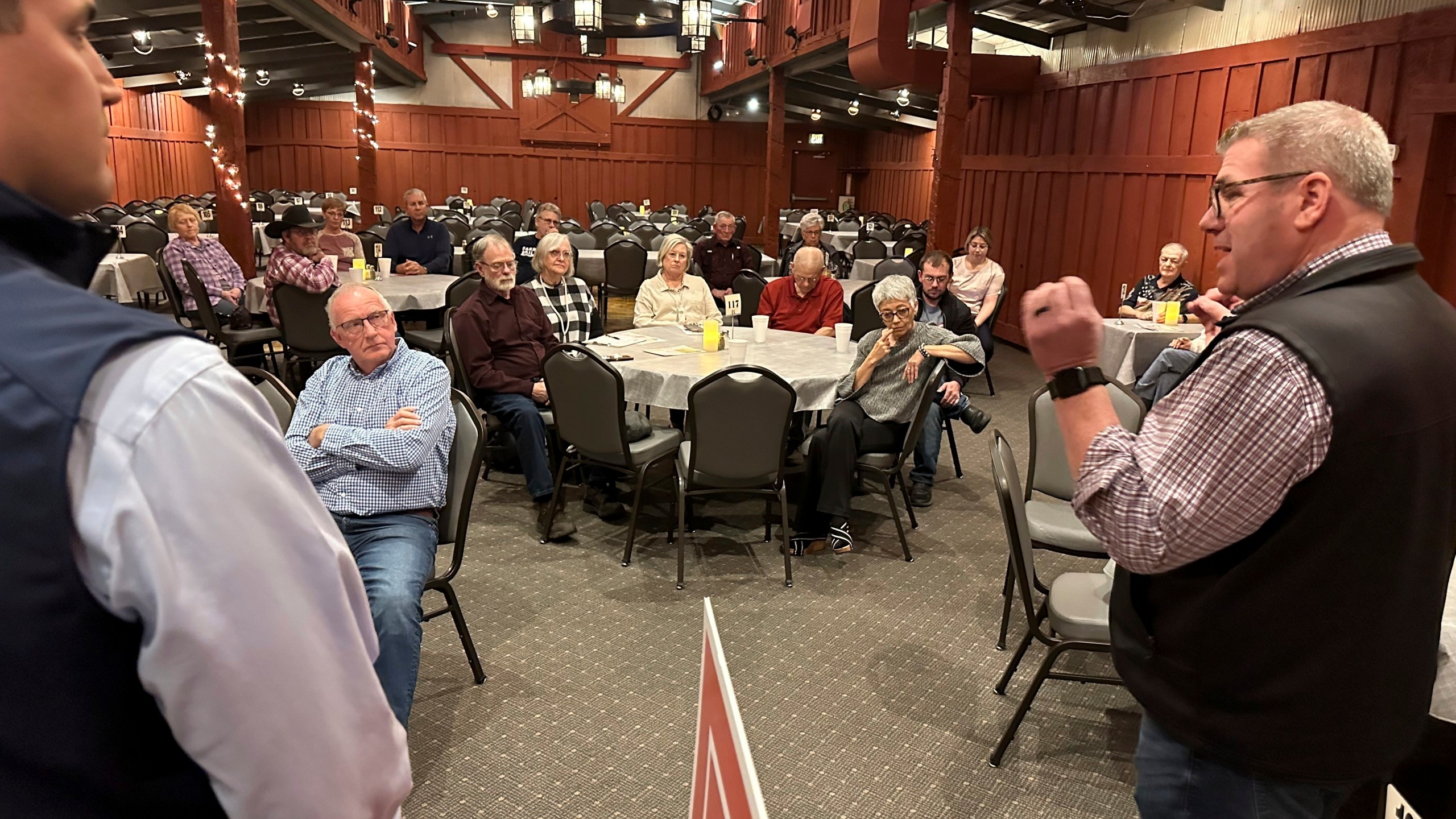 Congressional candidate Darren Bailey, right, speaks to a crowd at a restaurant during a campaign stop with state Rep. Adam Niemerg, Tuesday, Feb. 27, 2024, in Casey, Ill. Bailey, a former state senator and 2022 Republican nominee for governor, is running in the March 19th primary to unseat fellow GOP Congressman Mike Bost, a five-term incumbent who has the endorsement of former President Donald Trump, in Illinois' 12th District, which encompasses the bottom one-third of Illinois. (AP Photo/John O'Connor)