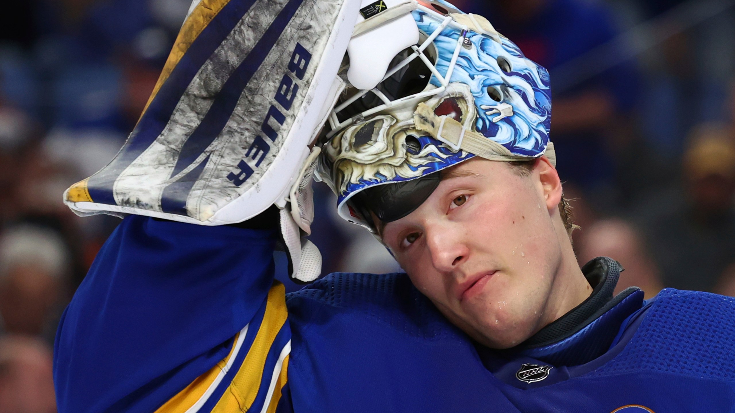 Buffalo Sabres goaltender Ukko-Pekka Luukkonen puts his mask on during the second period of the team's NHL hockey game against the New York Islanders on Thursday, March 14, 2024, in Buffalo, N.Y. (AP Photo/Jeffrey T. Barnes)