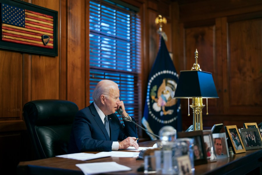 FILE - In this image provided by The White House, President Joe Biden speaks with Russian President Vladimir Putin on the phone from his private residence in Wilmington, Del., Dec. 30, 2021. Biden's sprawling home outside downtown Wilmington, has a special place in his heart. When he met special prosecutor Robert Hur to talk about the sensitive documents he’d improperly kept after his vice presidency, Biden told Hur three times he is a “frustrated architect.” (Adam Schultz/The White House via AP, File)